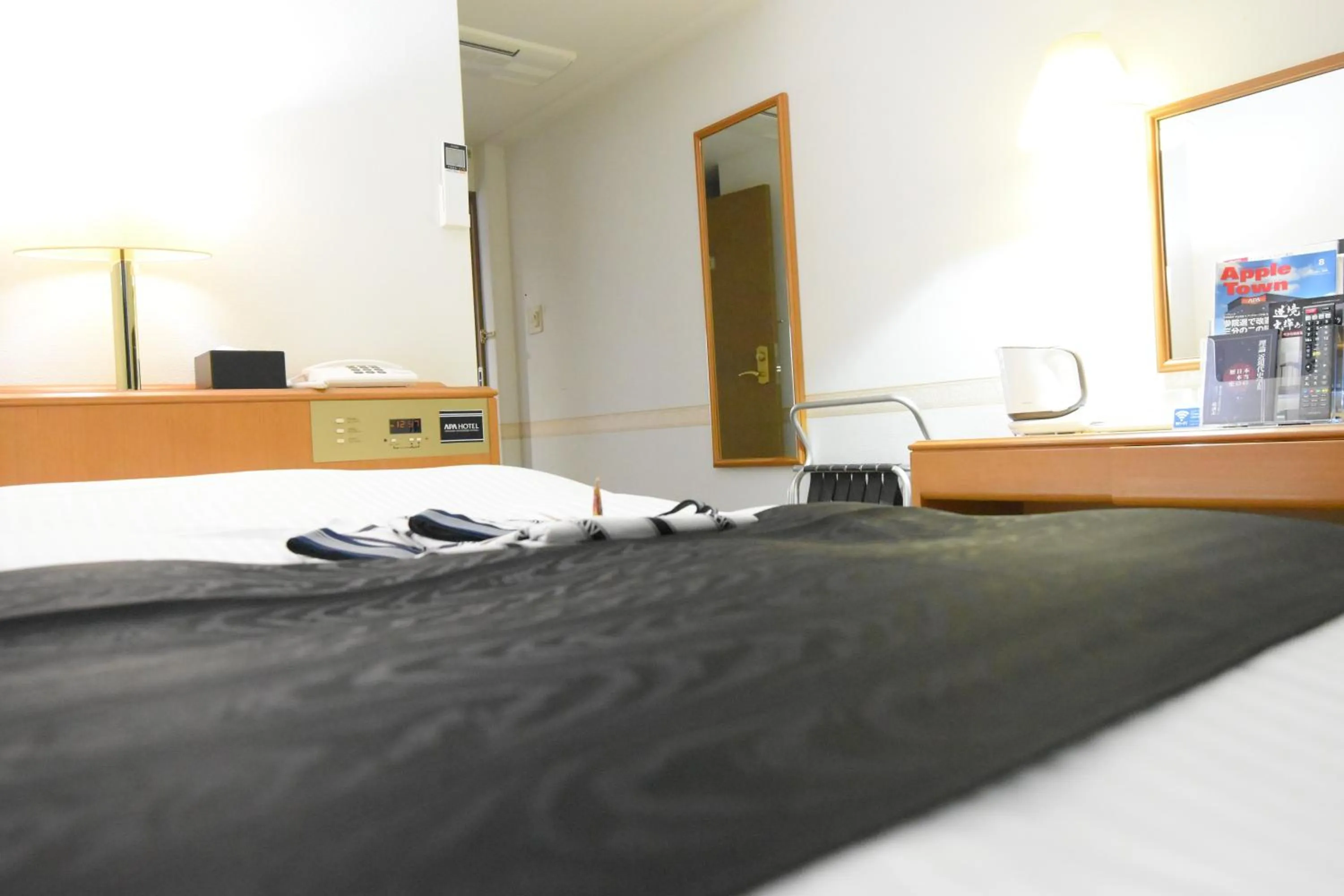 Bed in APA Hotel Miyazaki Miyakonojo Ekimae