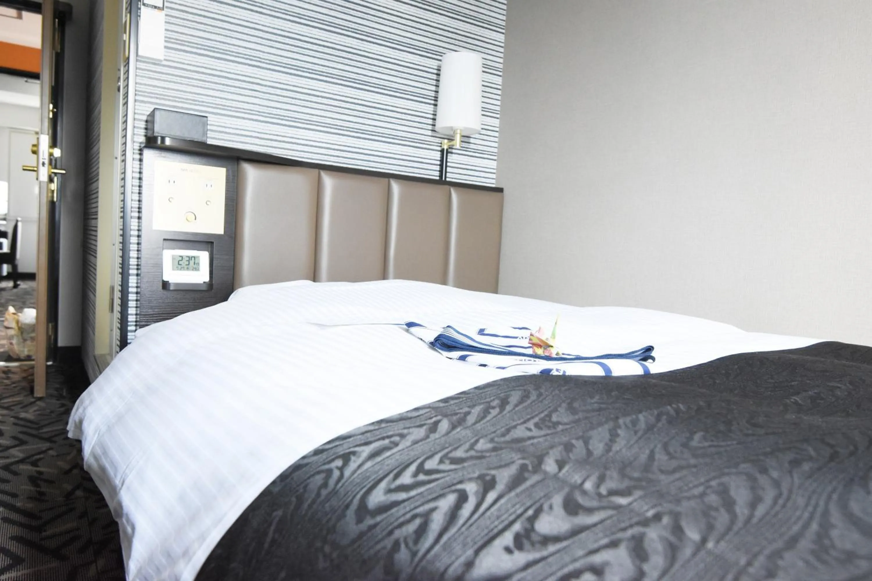 Bed in APA Hotel Miyazaki Miyakonojo Ekimae