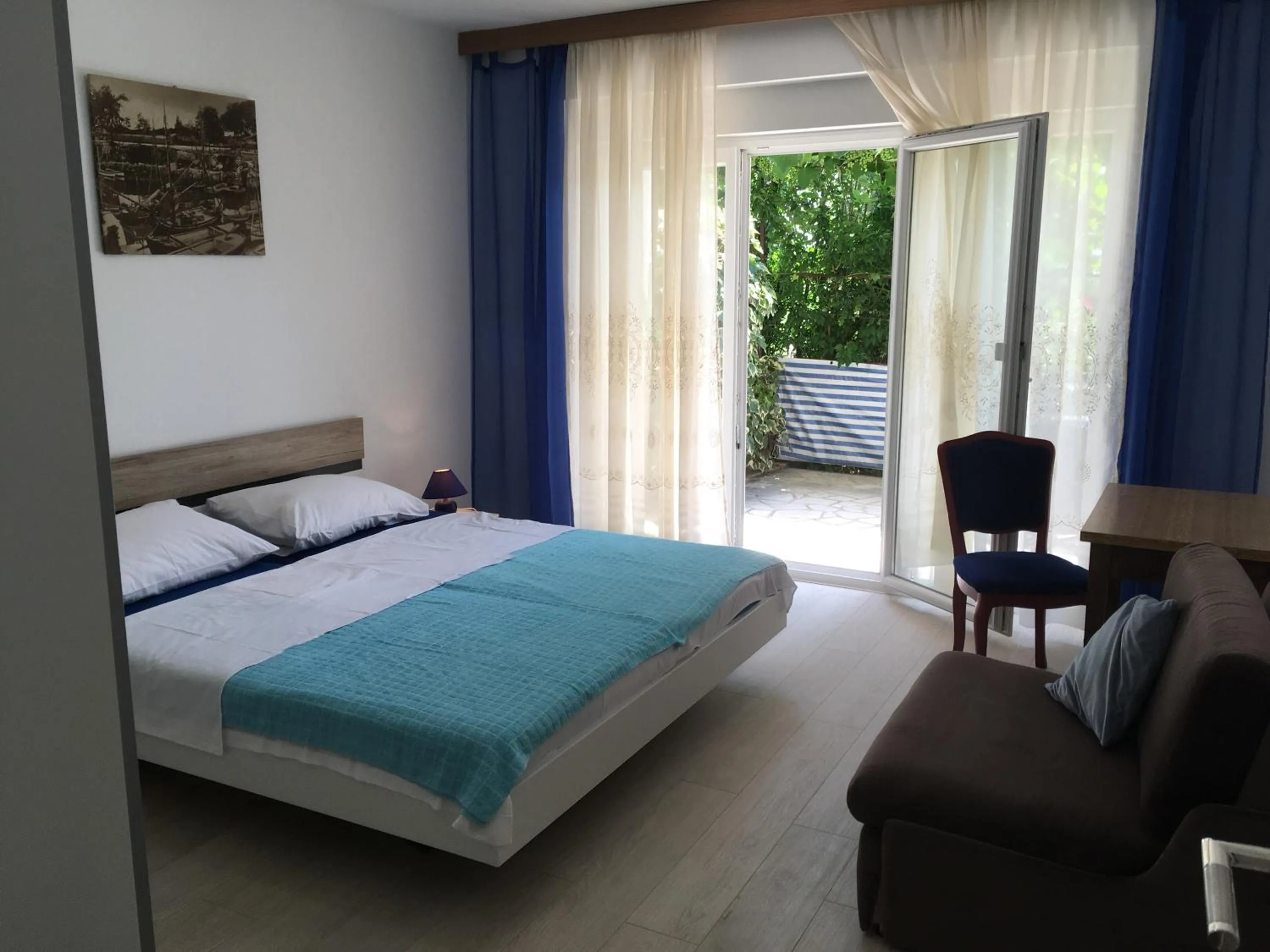 Bed in Apartments Paco & Bony