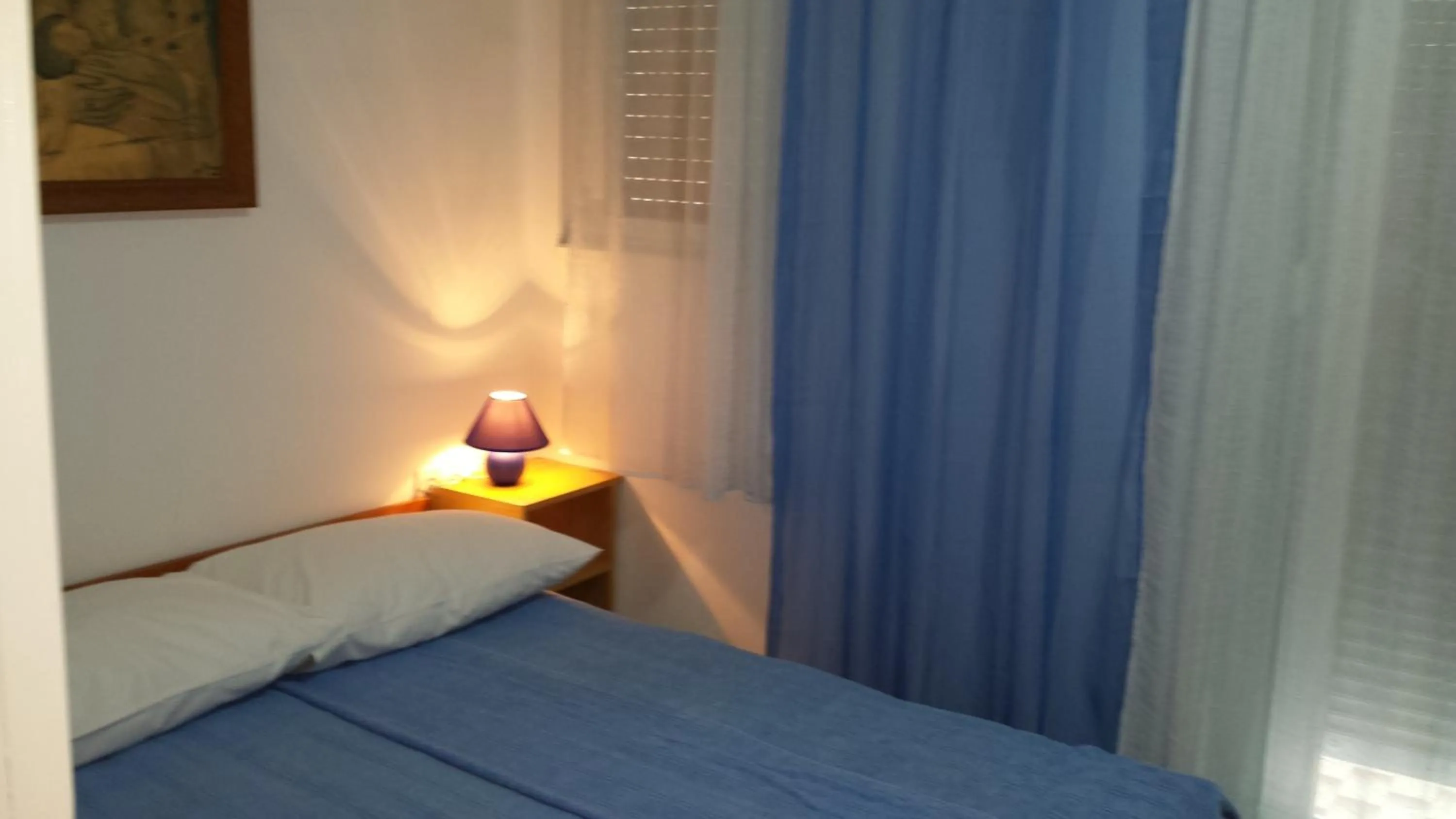 Bed in Apartments Paco & Bony