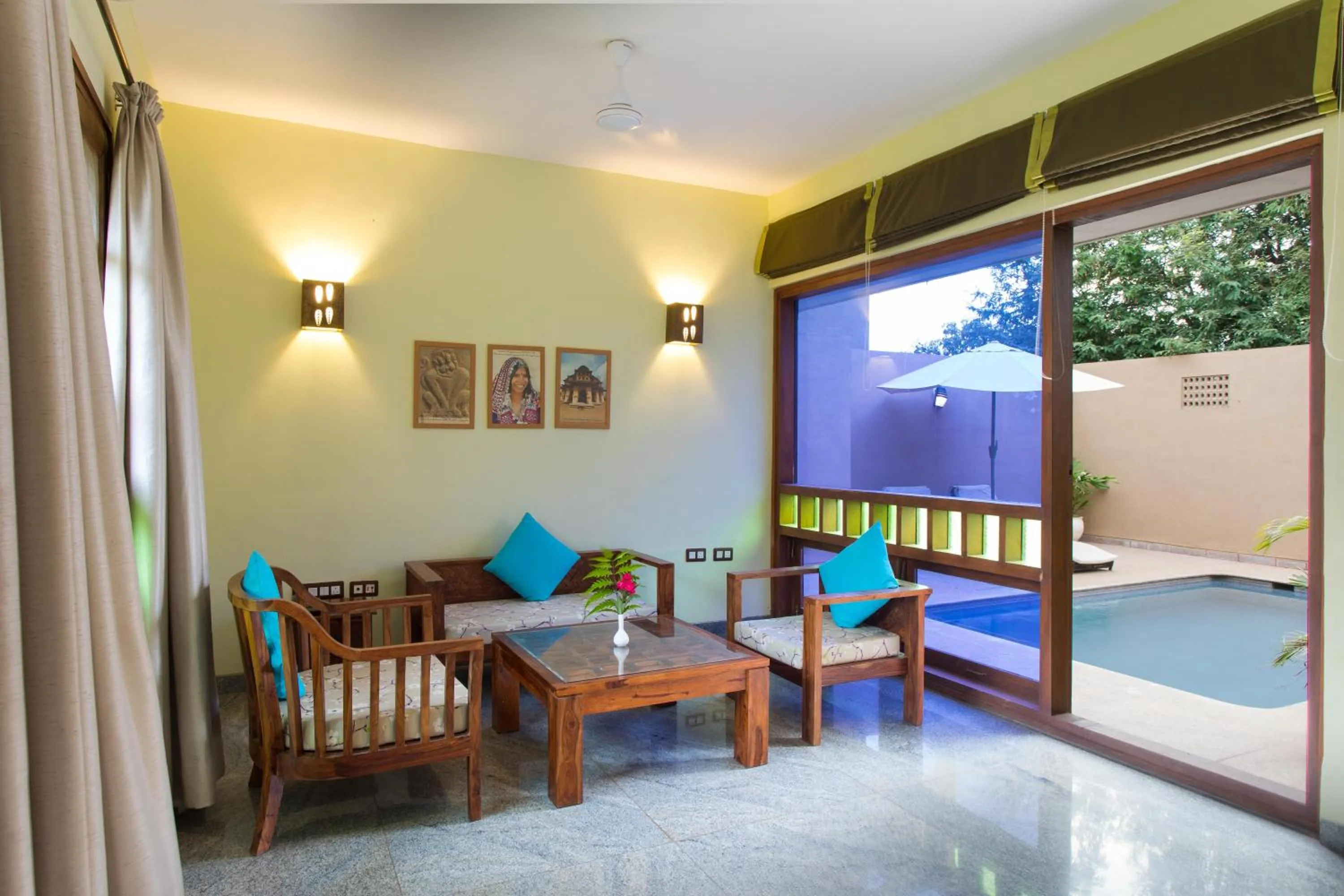 Living room, Bed in Heritage Resort Hampi