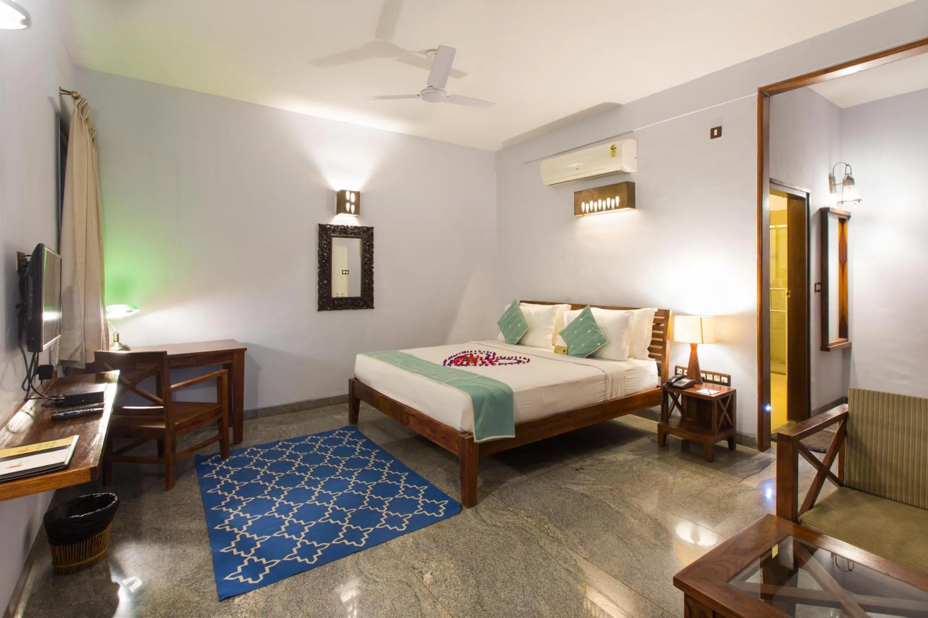 Bed in Heritage Resort Hampi