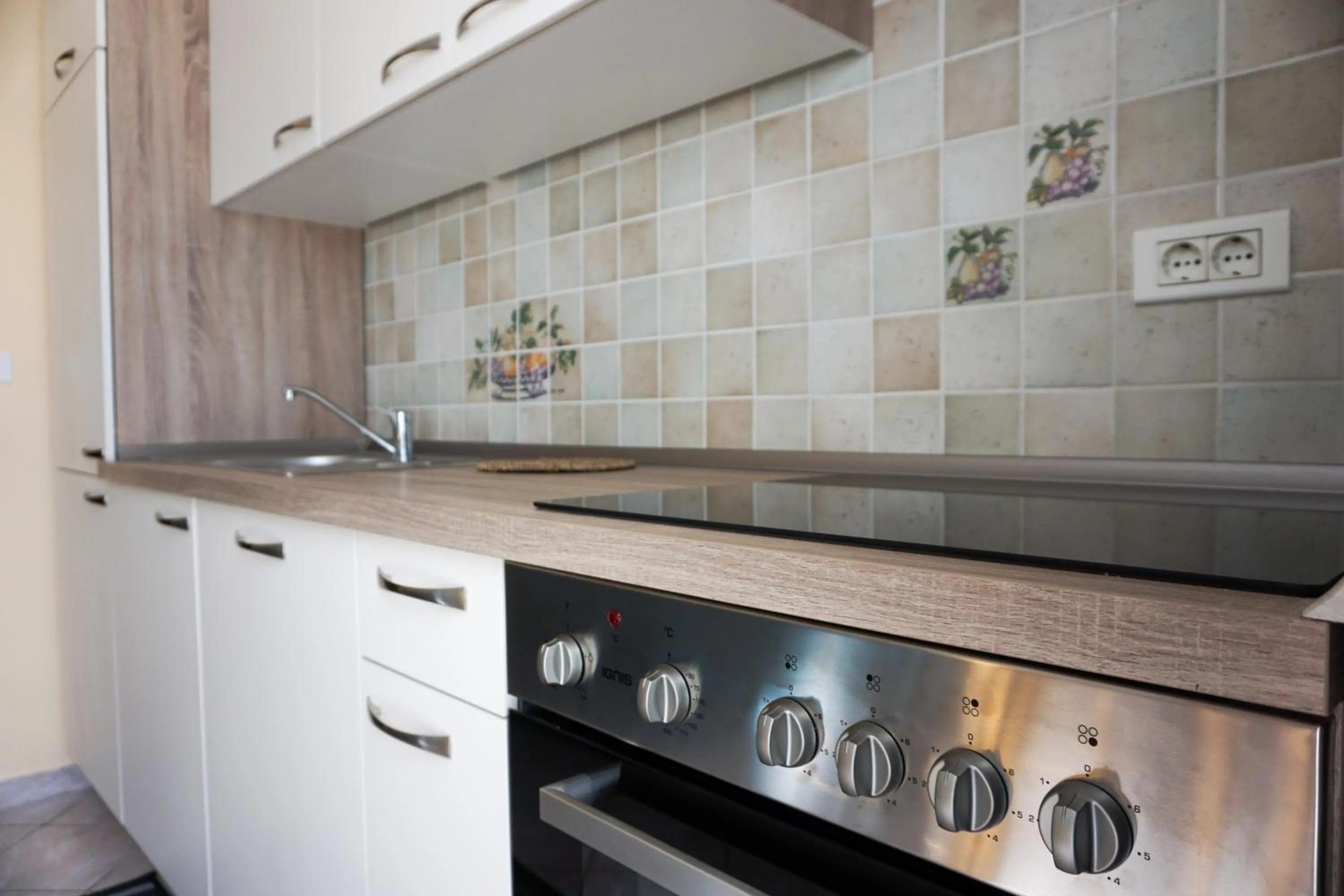 Kitchen or kitchenette in Apartments Kravanja