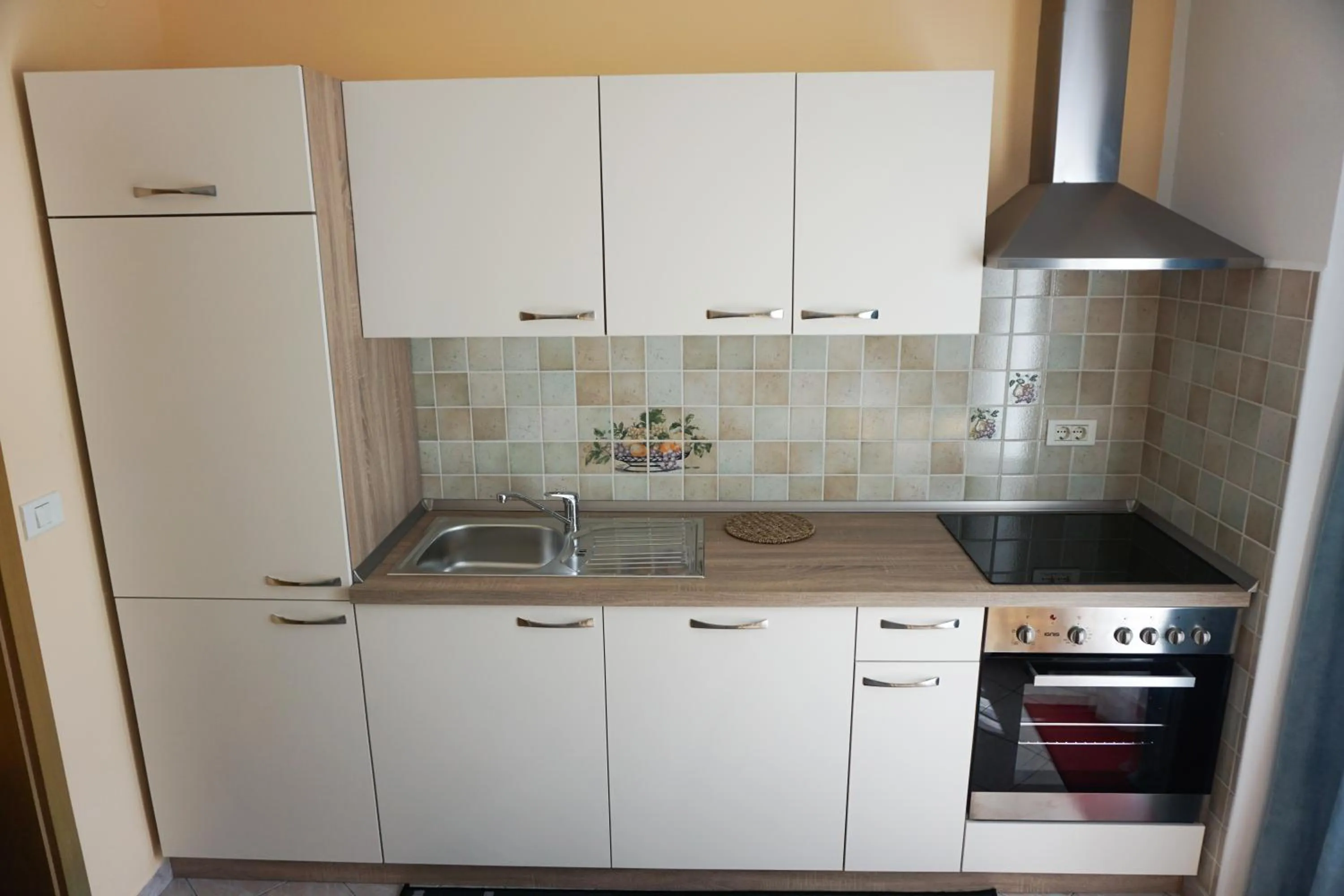 Kitchen or kitchenette in Apartments Kravanja