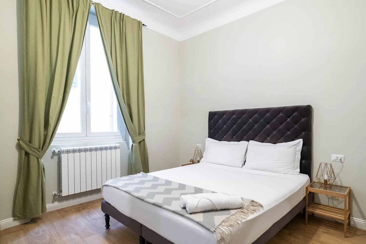 Bed in La Piazzetta Rooms & Apartments