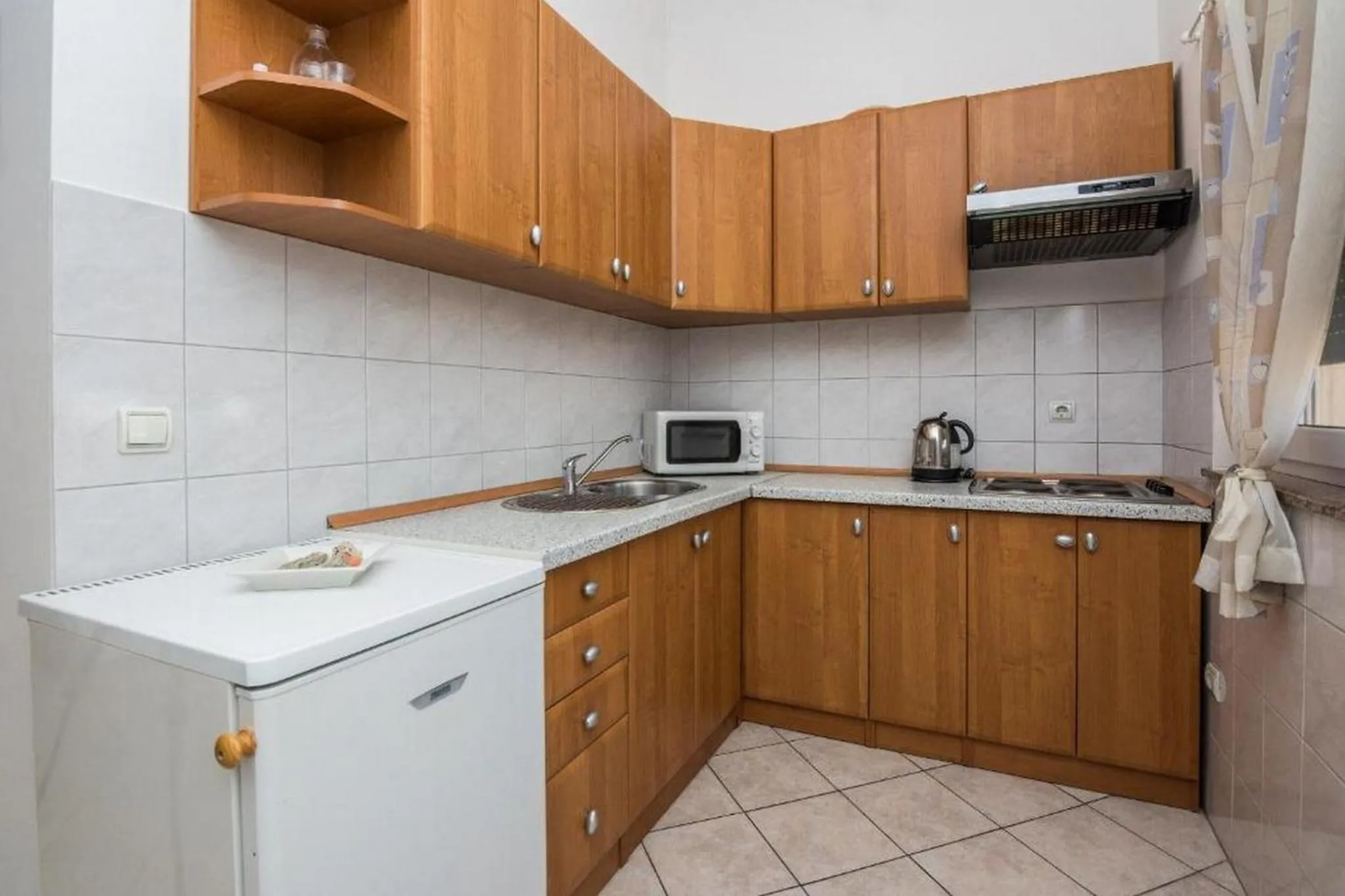 Kitchen or kitchenette in Apartments Delic-Pejic
