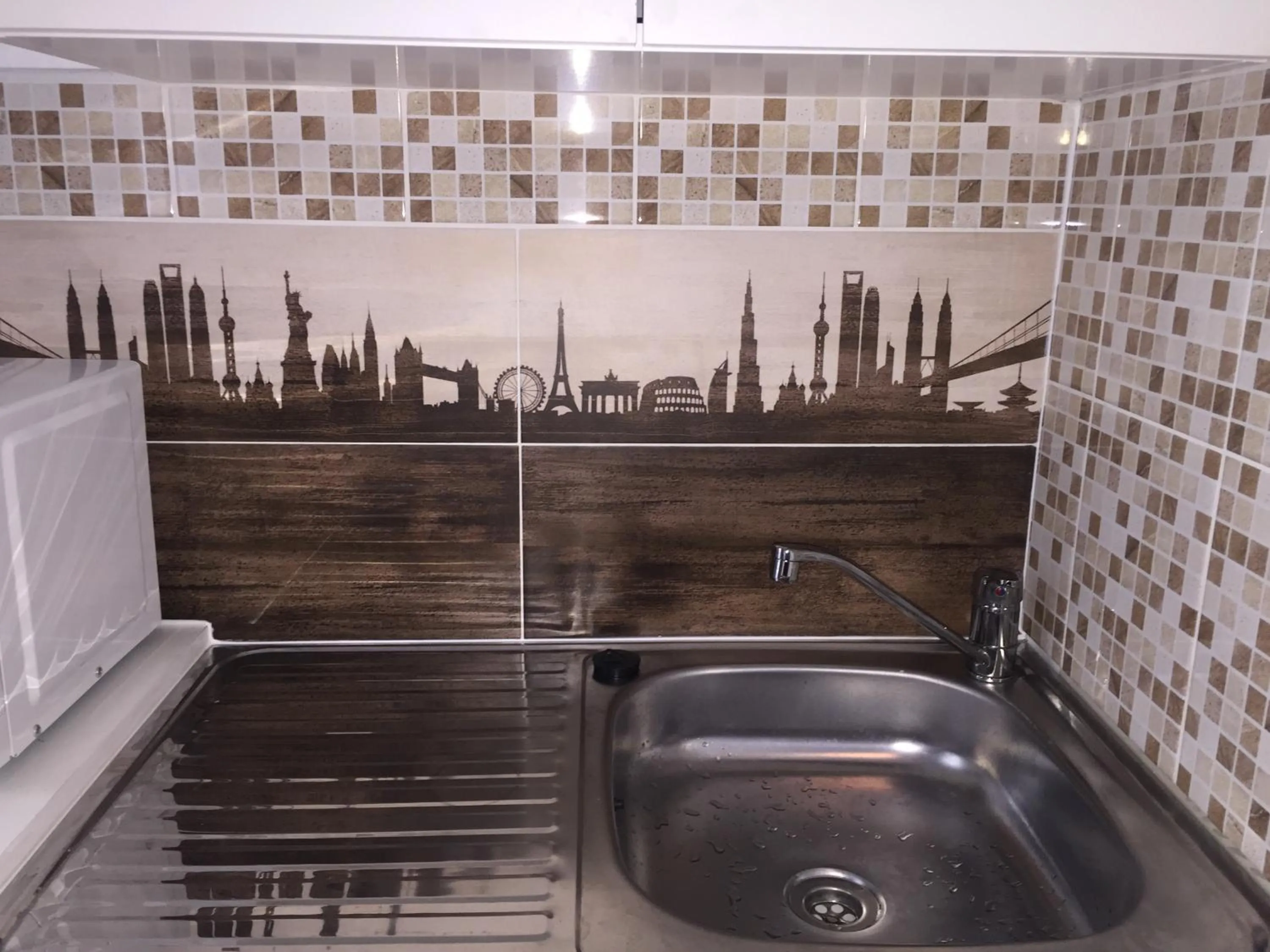 Kitchen or kitchenette in Omega Guesthouse Budapest