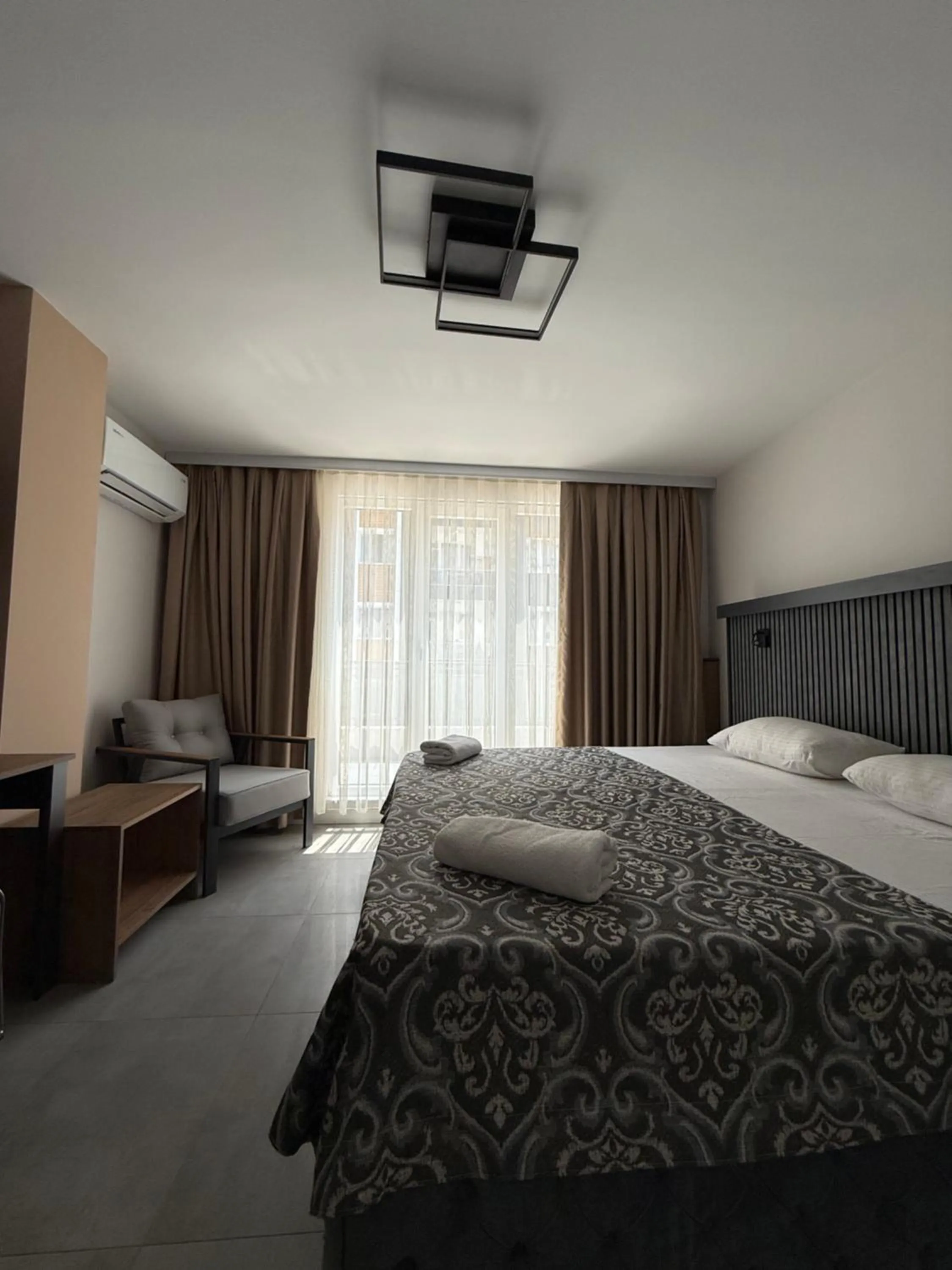 Bed in D'Premium Hotel