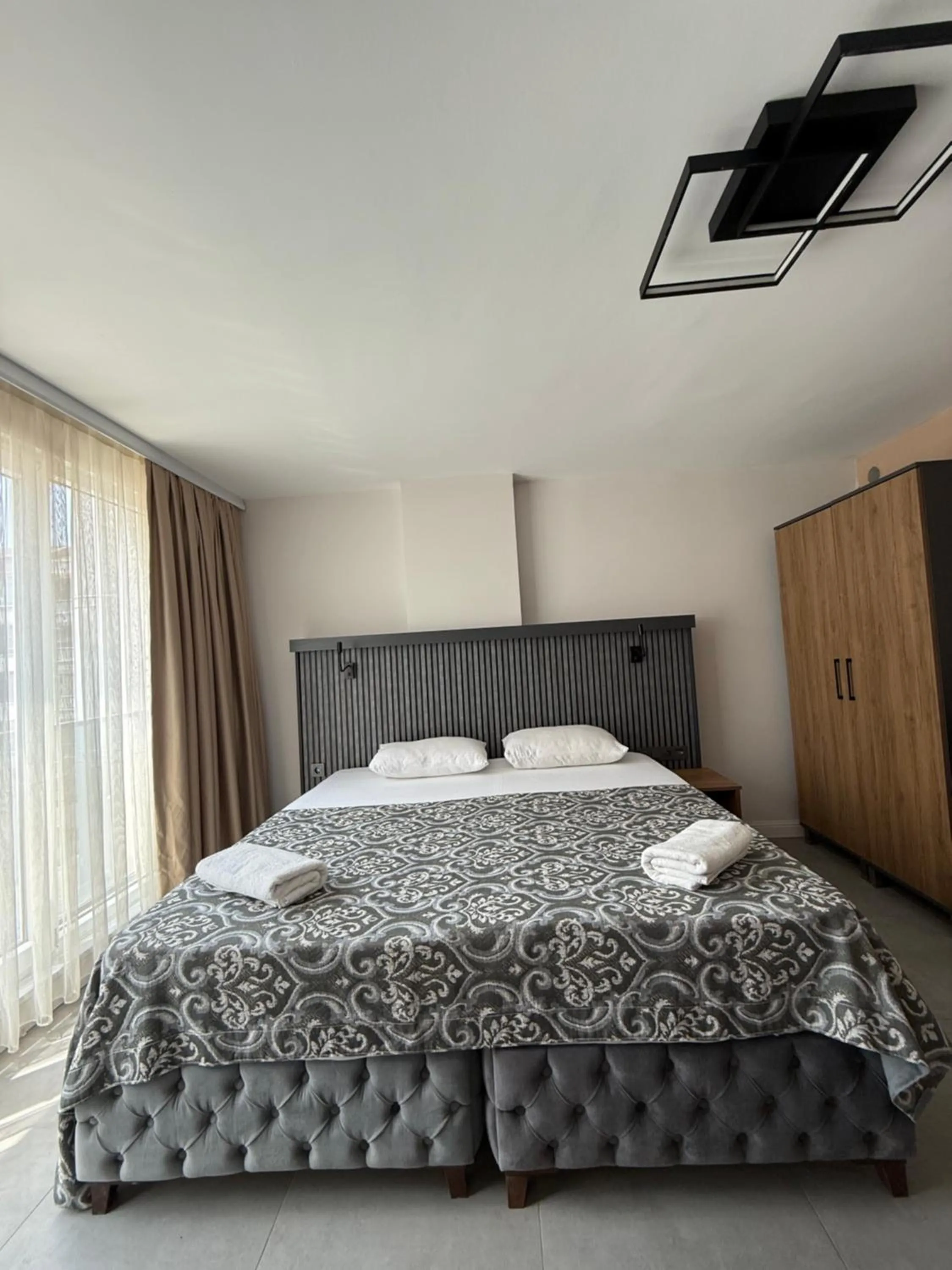 Bed in D'Premium Hotel