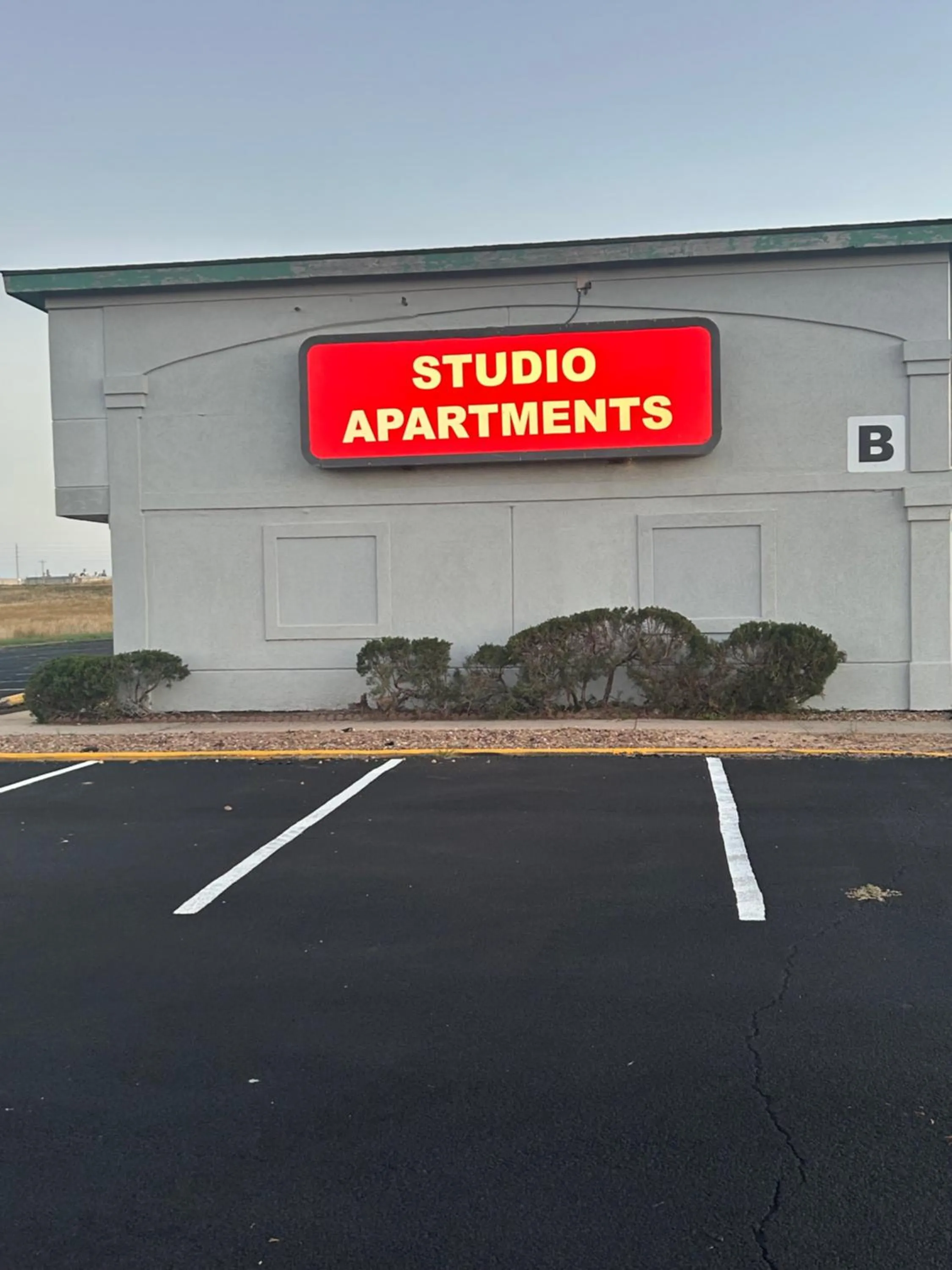 Property logo or sign in Studio Apartments