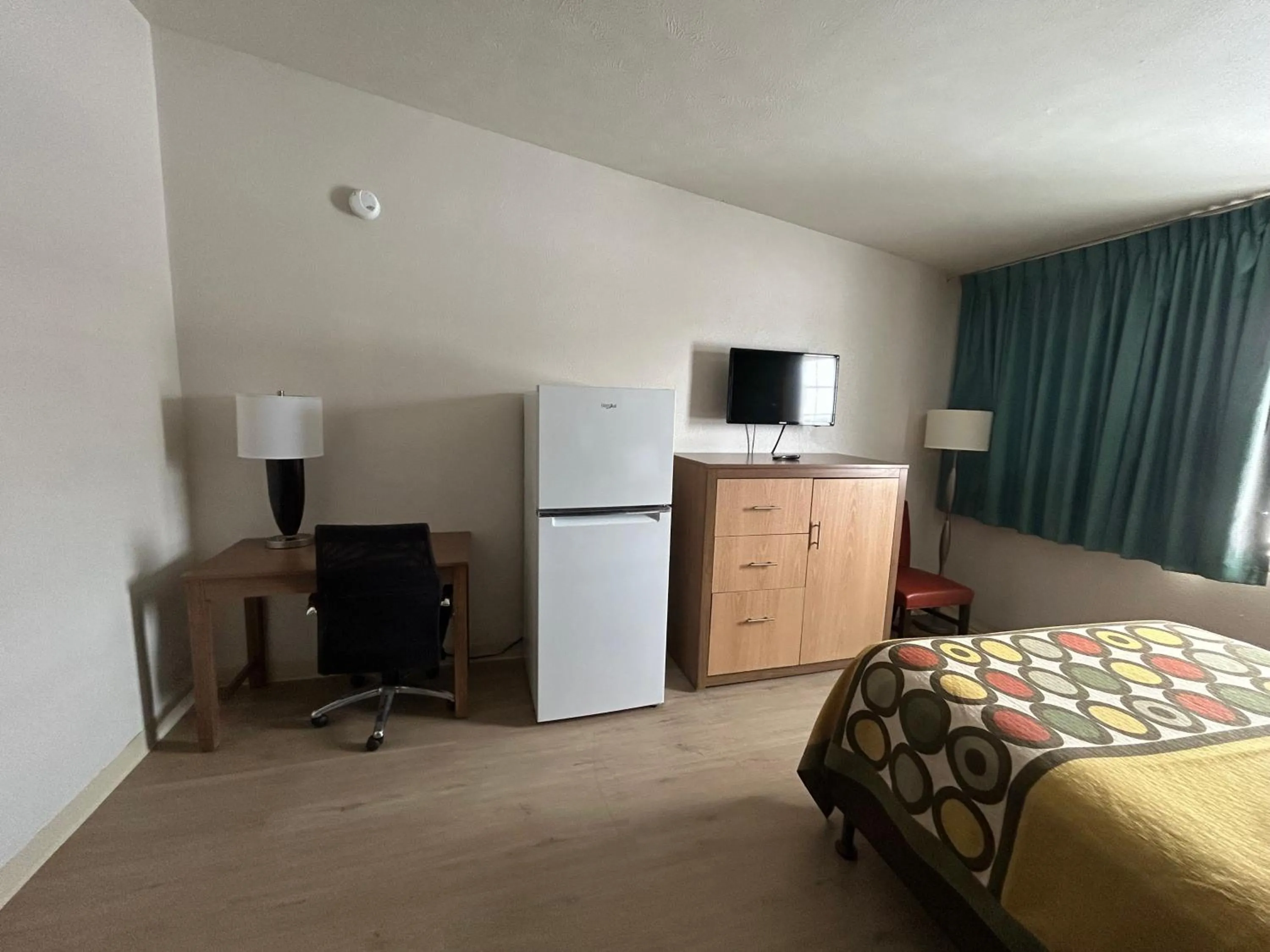 Kitchen or kitchenette, Bed in Studio Apartments