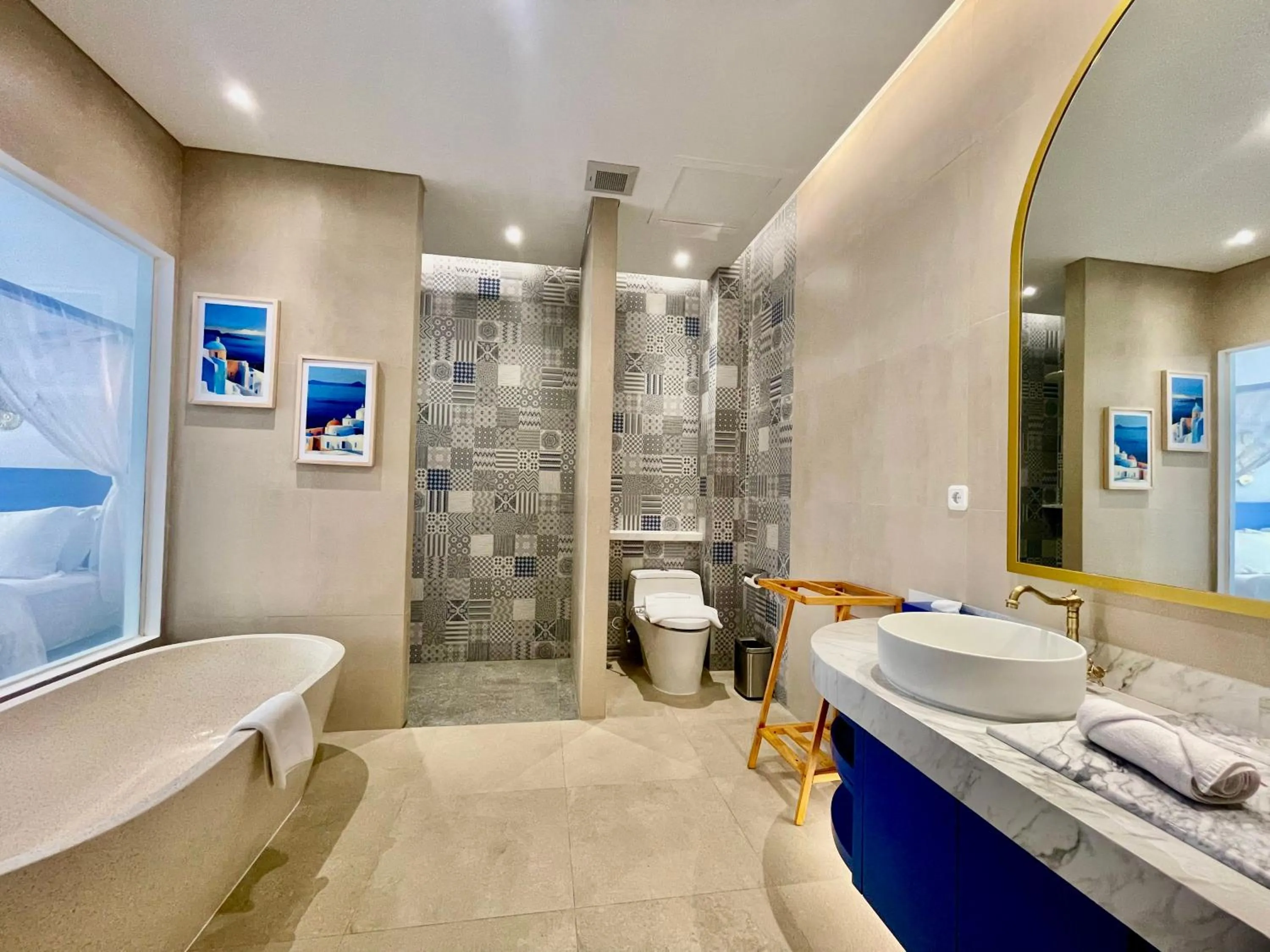 Bathroom in Hemangini Hotel Bandung