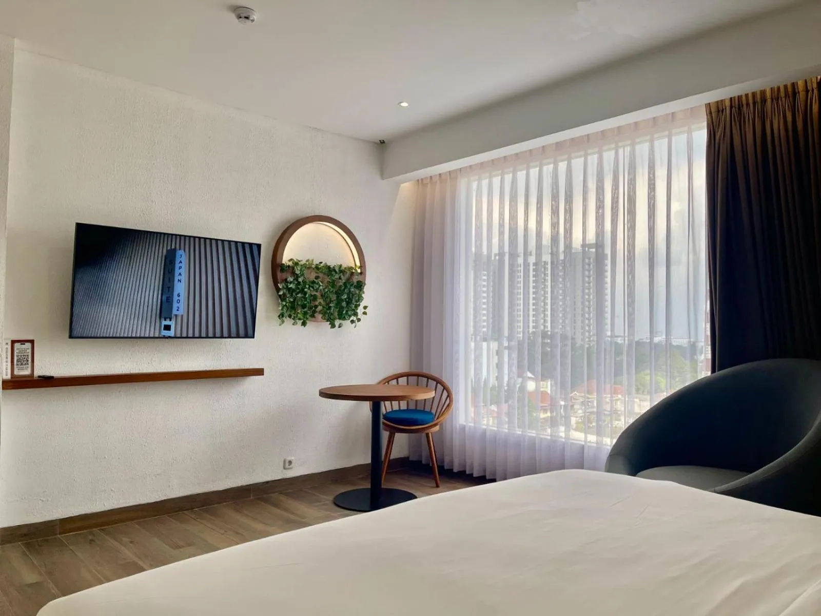Bed in Hemangini Hotel Bandung