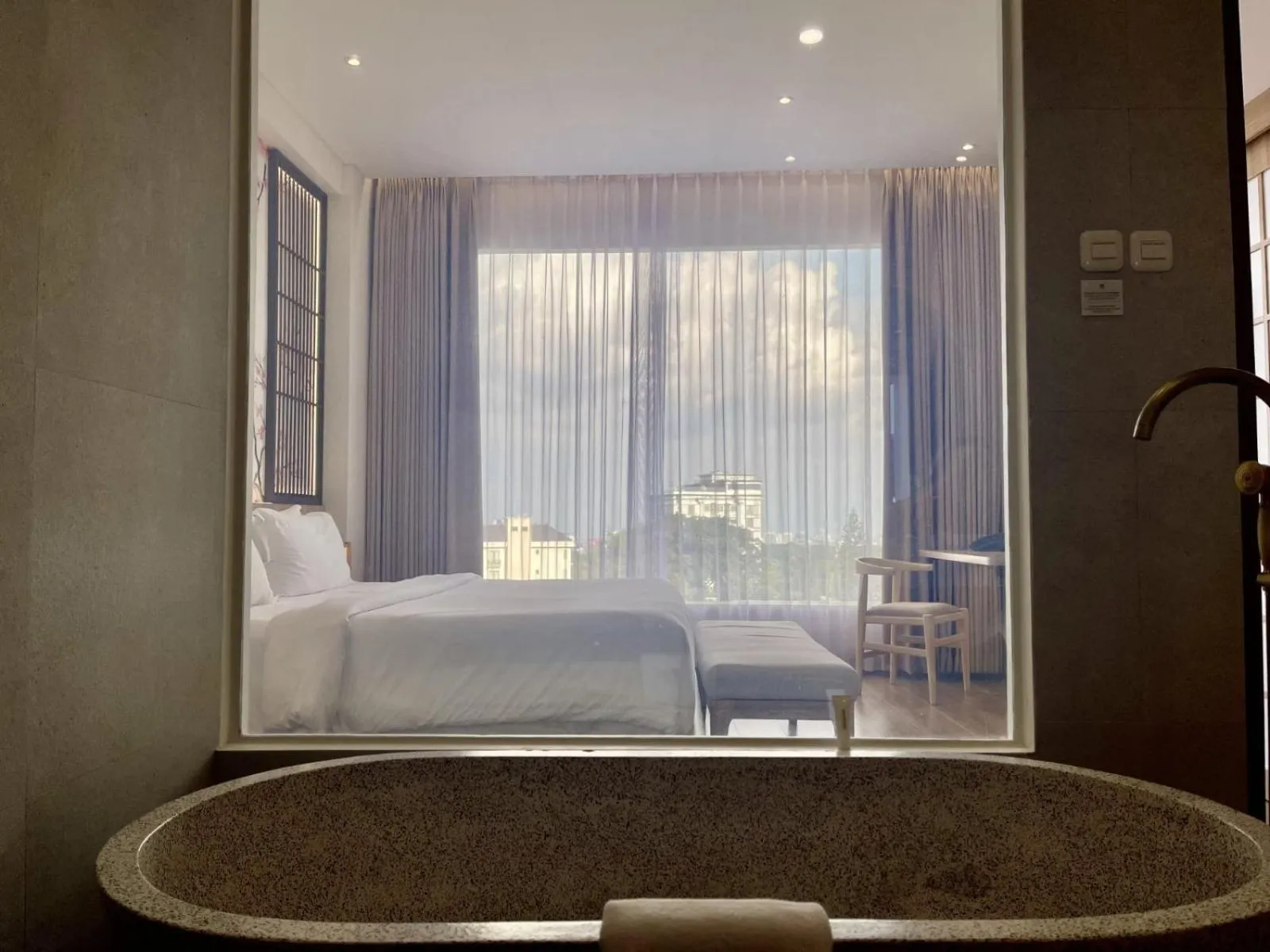 Bath, Bed in Hemangini Hotel Bandung