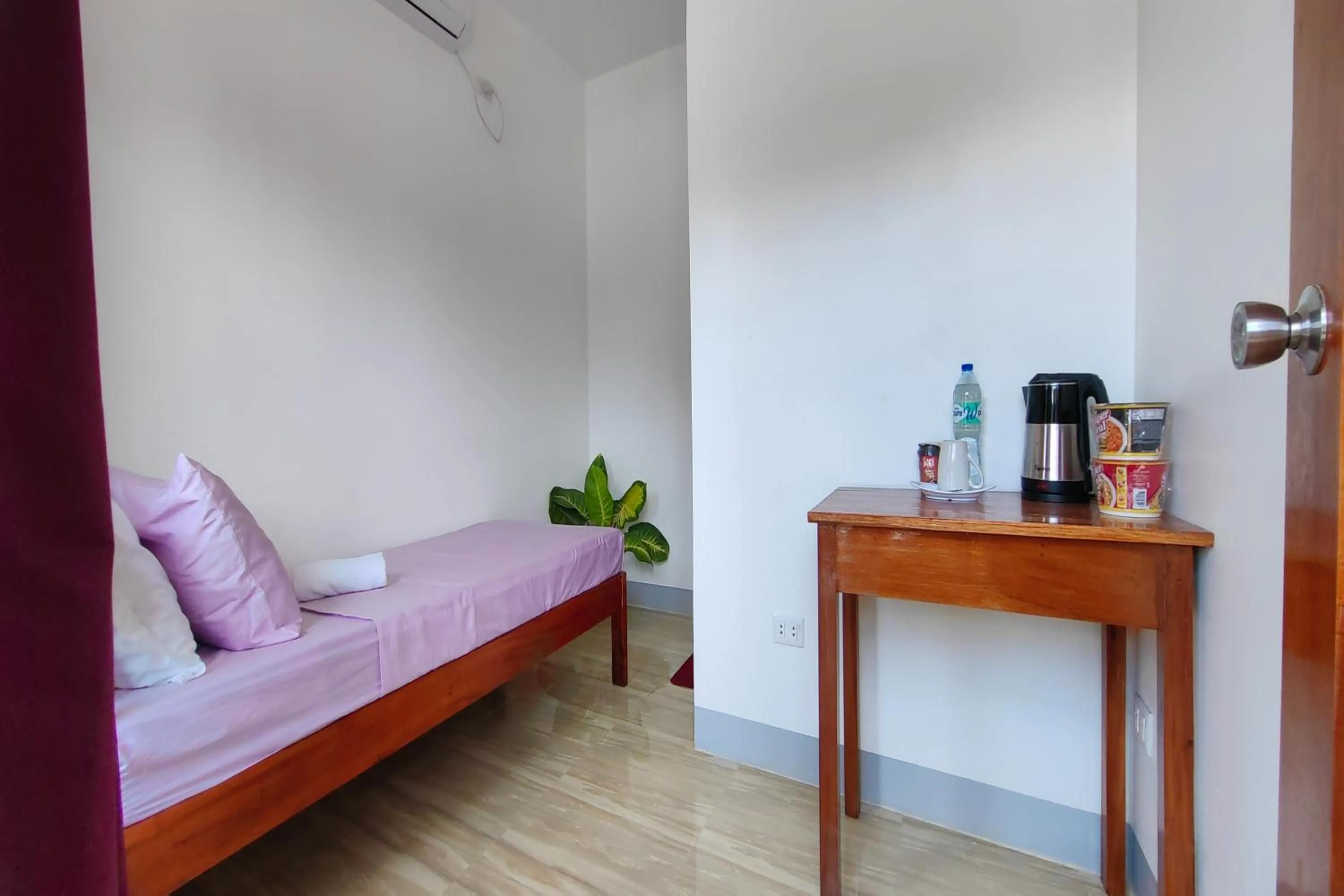 Bed in Kamalay Pension House