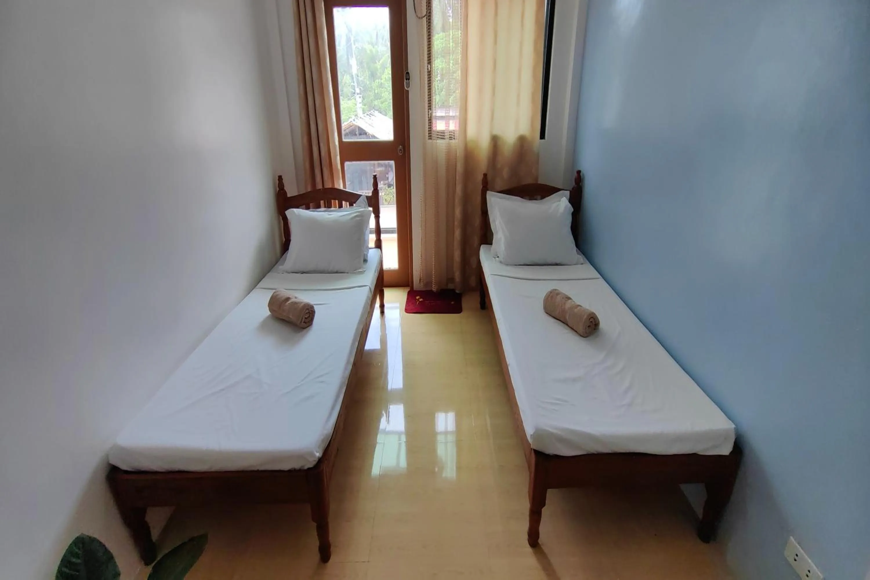 Bed in Kamalay Pension House
