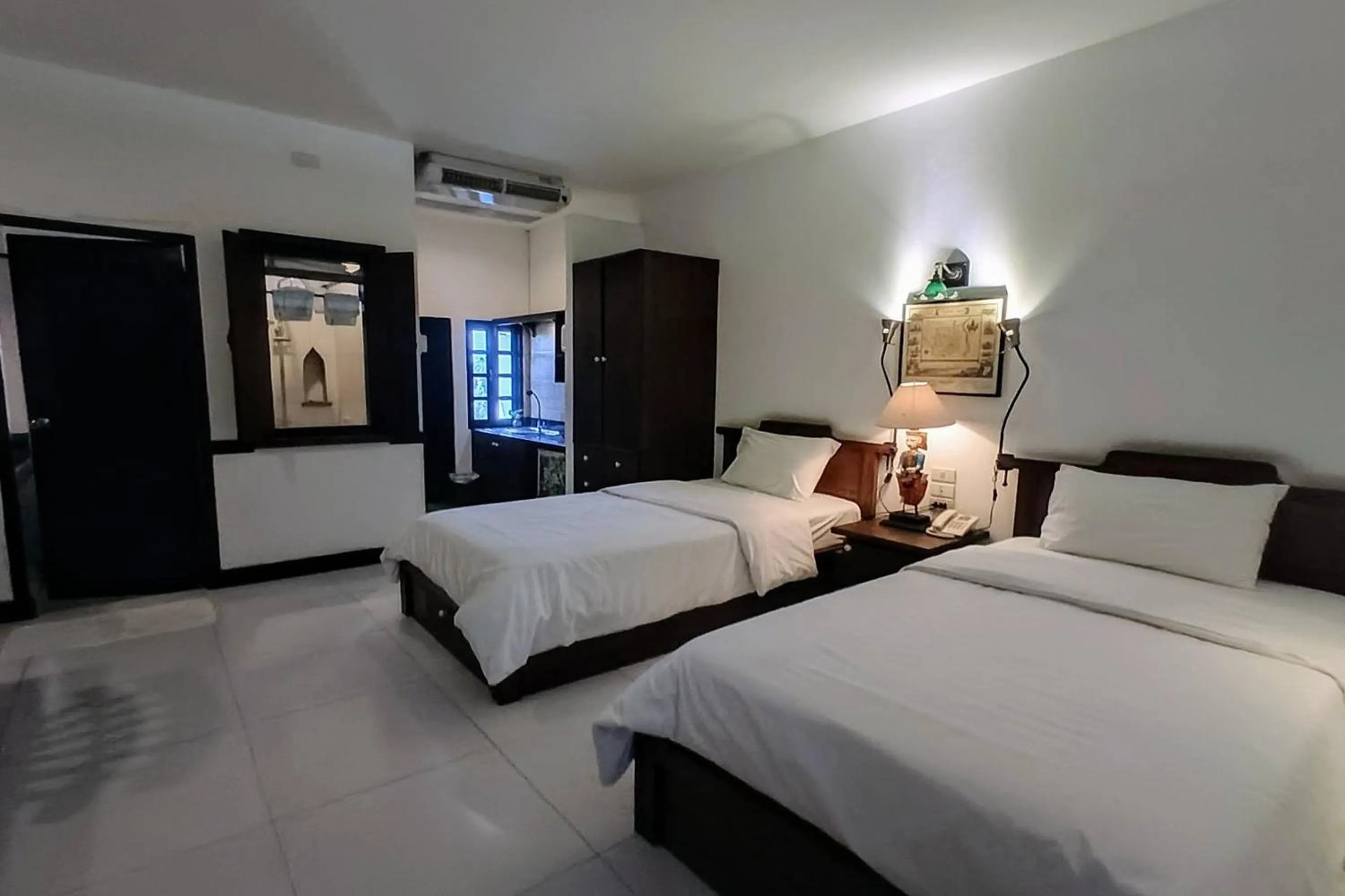 Bed in Baan Orawee Boutique Hotel