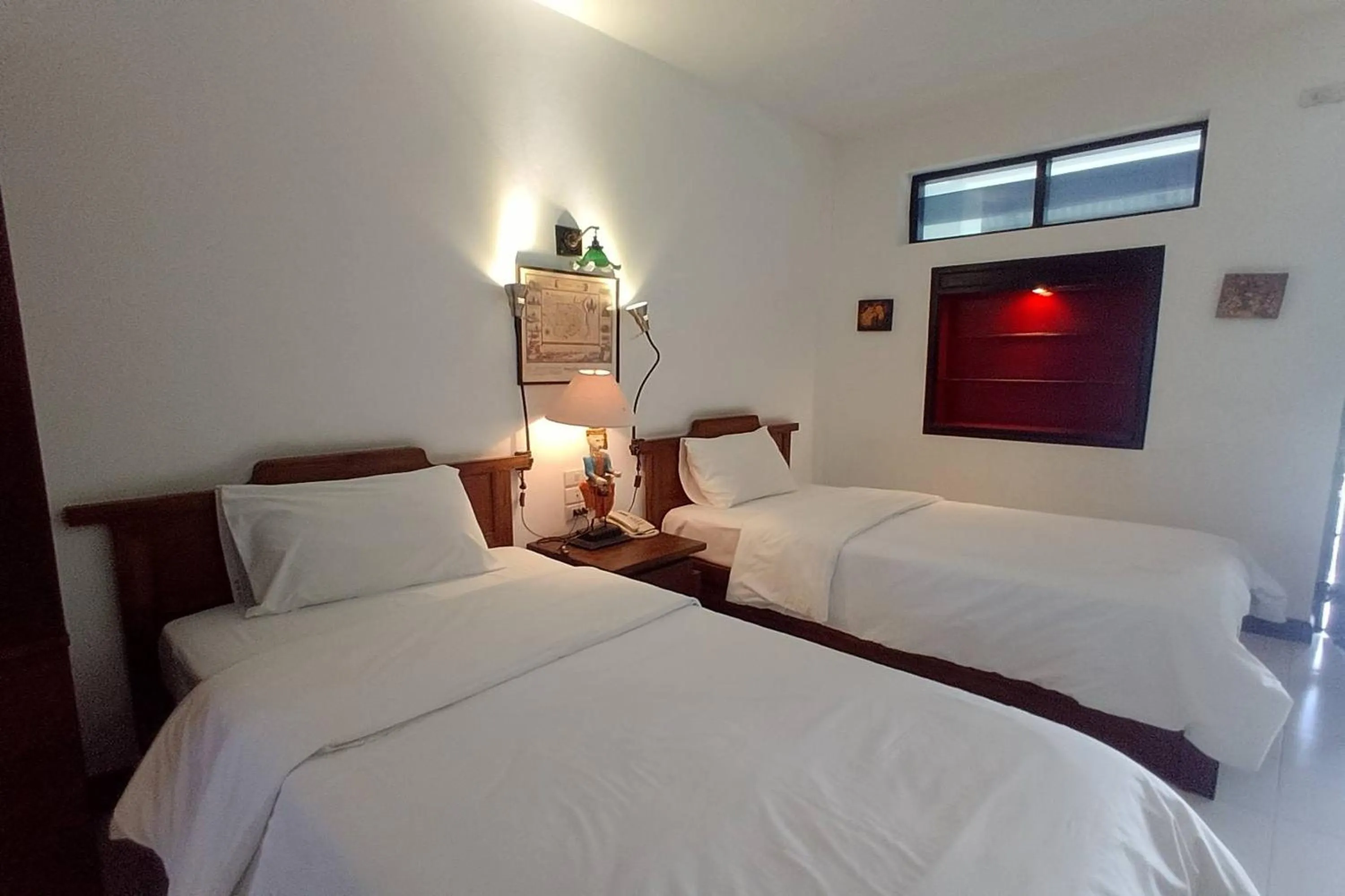 Bed in Baan Orawee Boutique Hotel