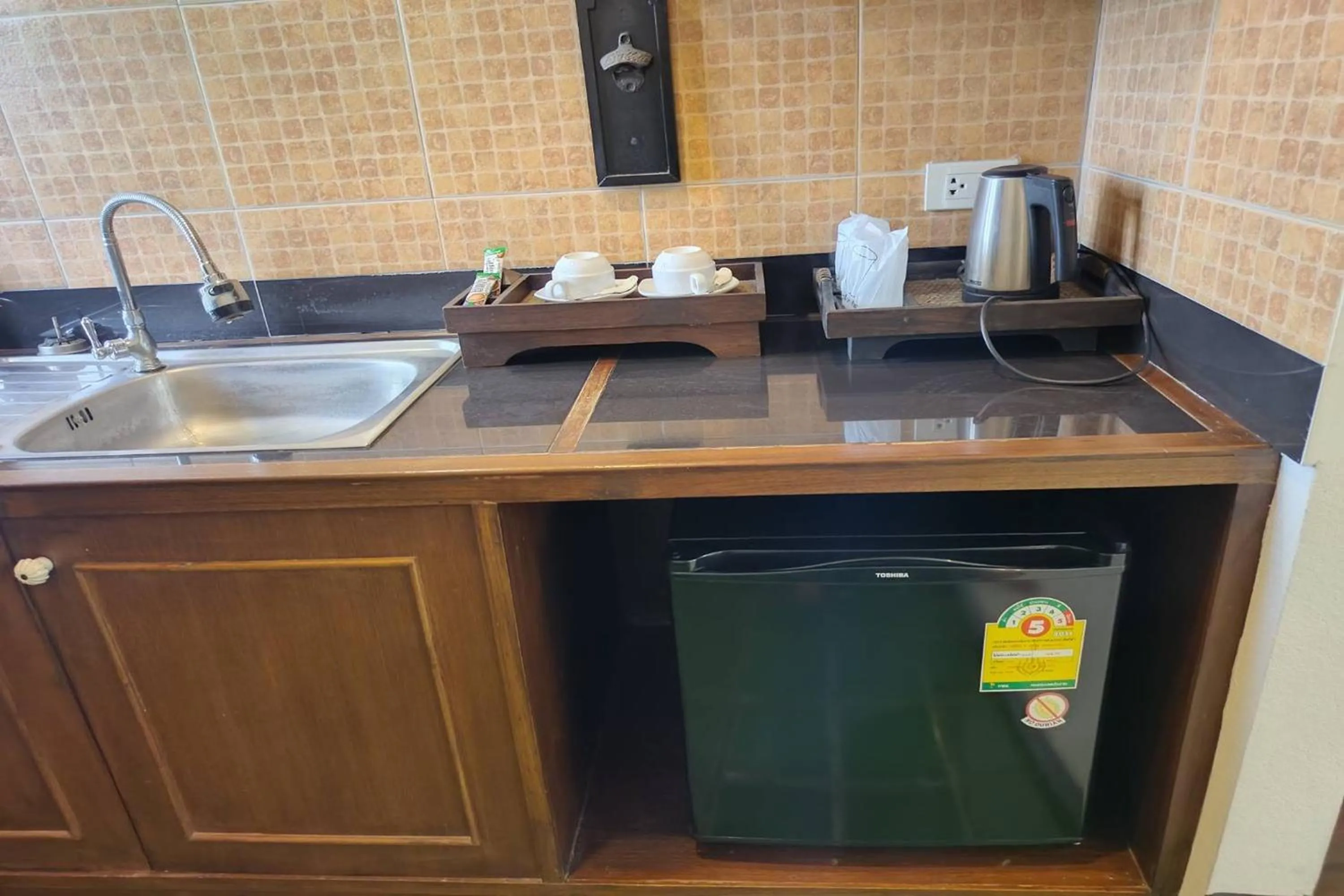 Kitchen or kitchenette in Baan Orawee Boutique Hotel