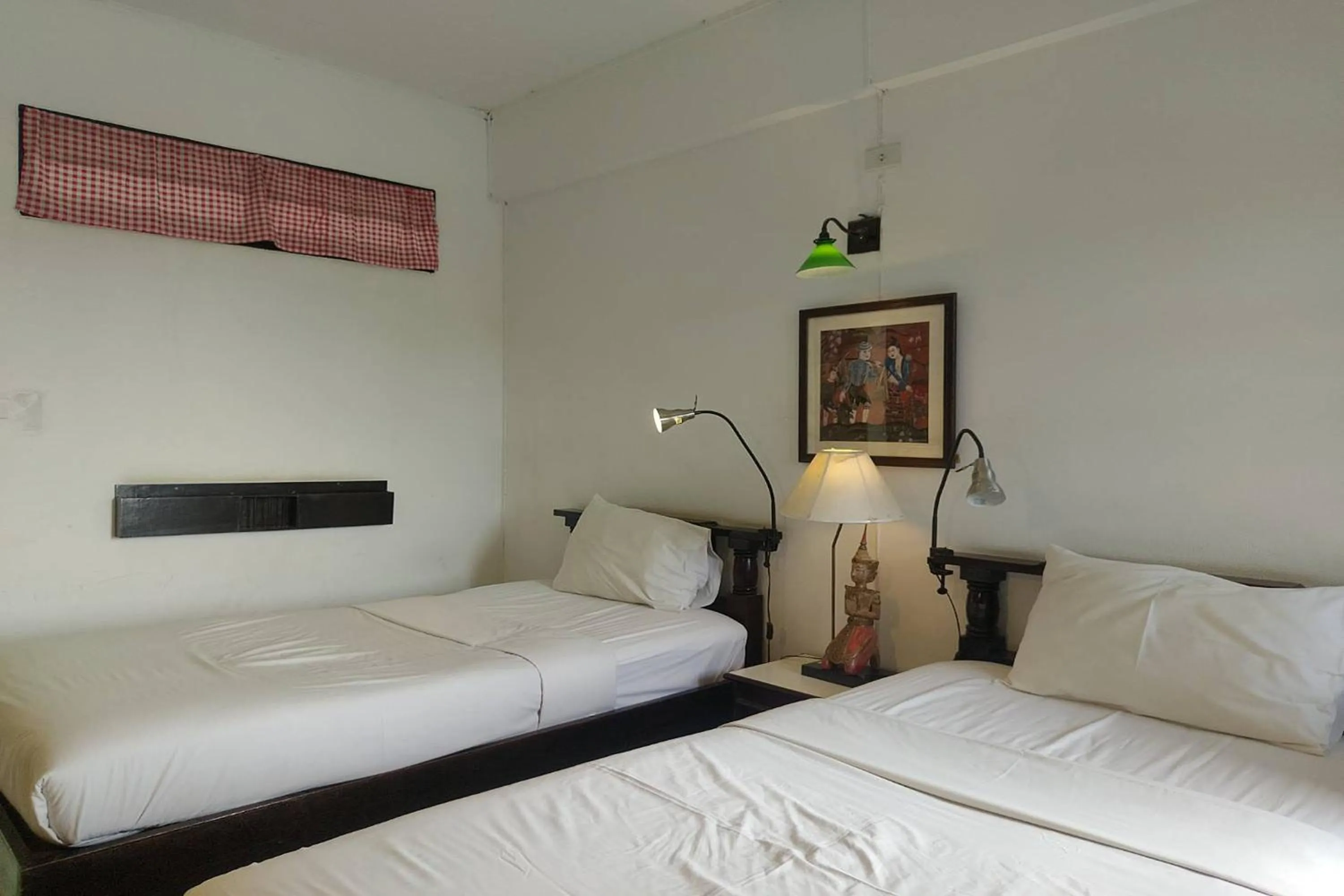 Bed in Baan Orawee Boutique Hotel