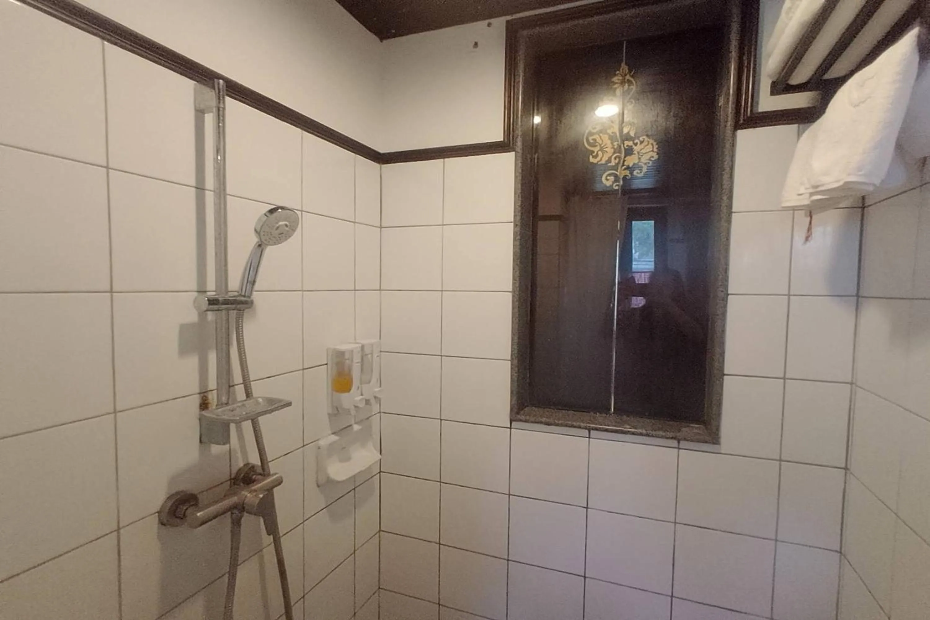 Shower in Baan Orawee Boutique Hotel