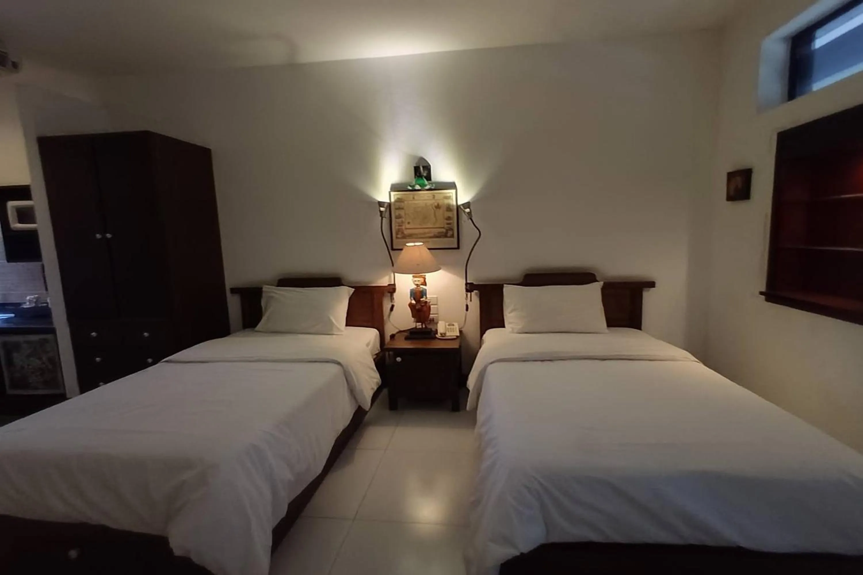 Bed in Baan Orawee Boutique Hotel