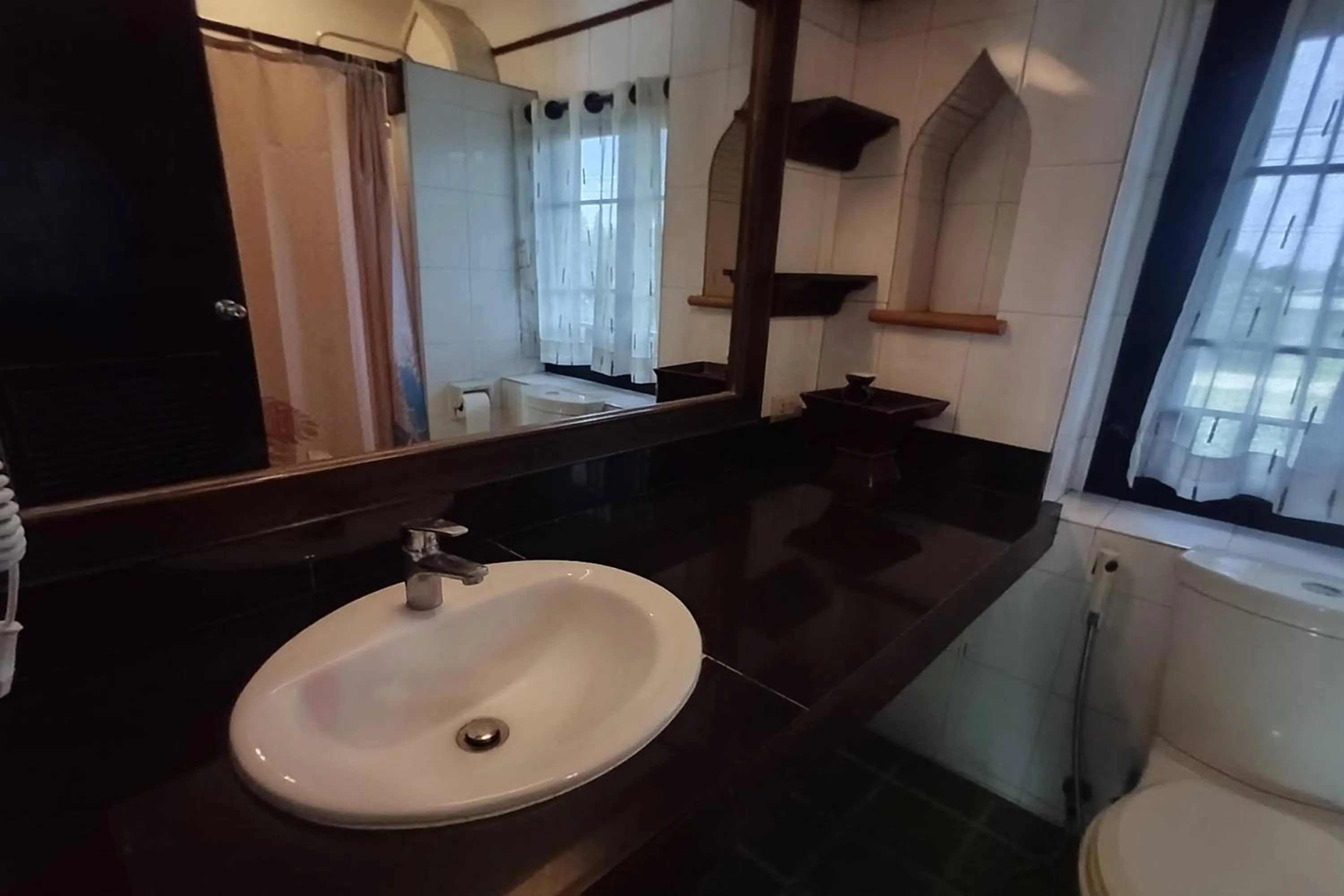 Bathroom in Baan Orawee Boutique Hotel