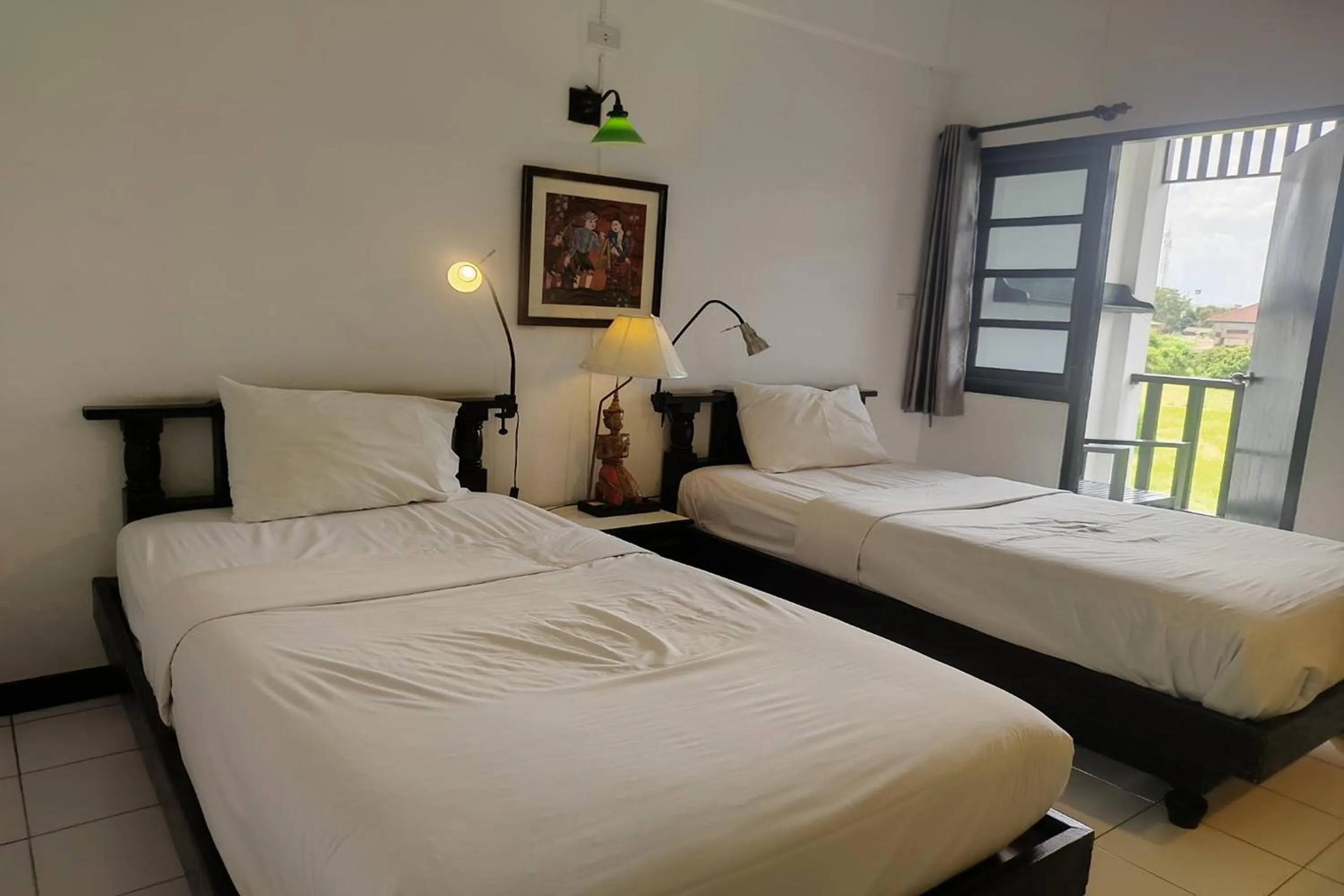 Bed in Baan Orawee Boutique Hotel