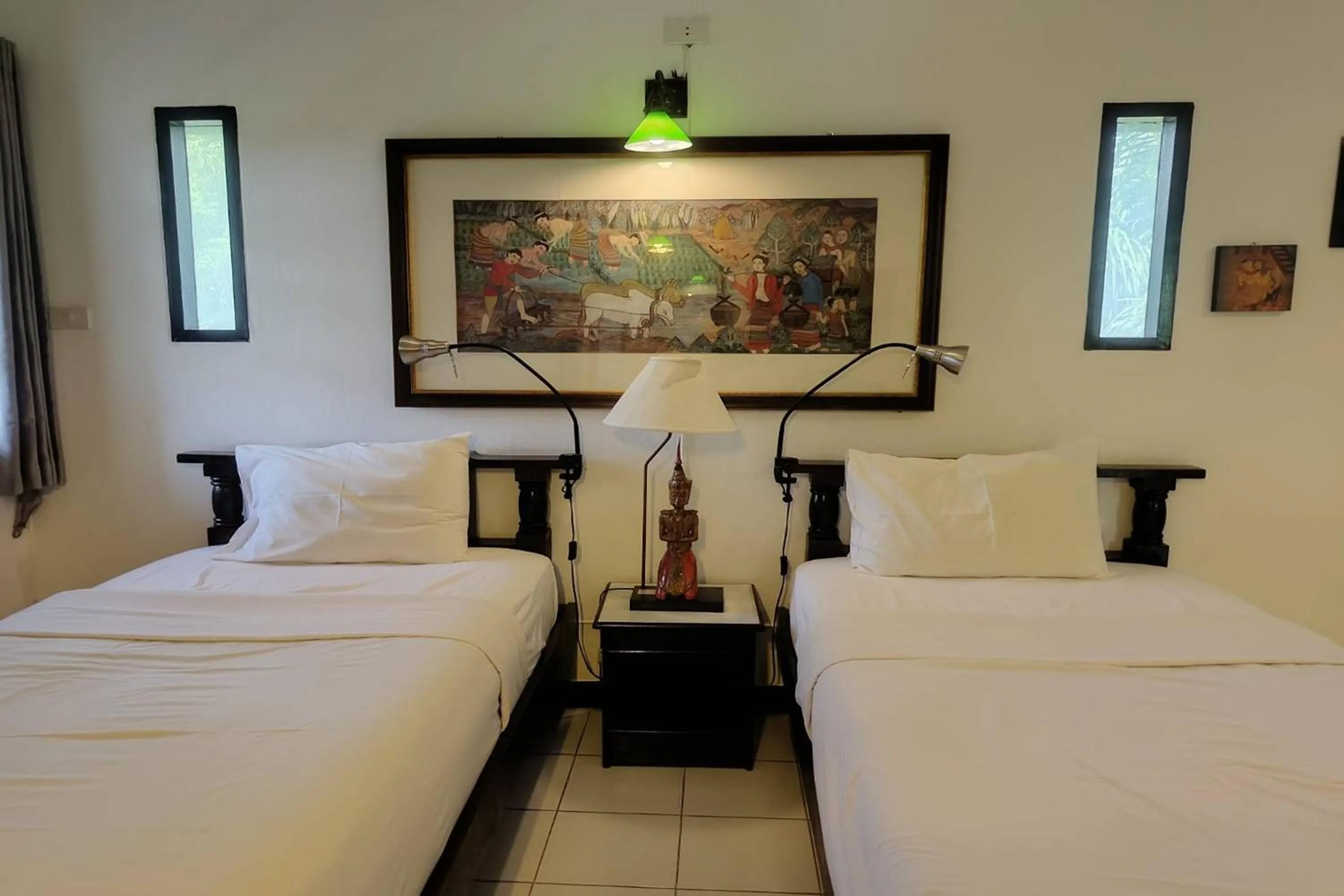 Bed in Baan Orawee Boutique Hotel