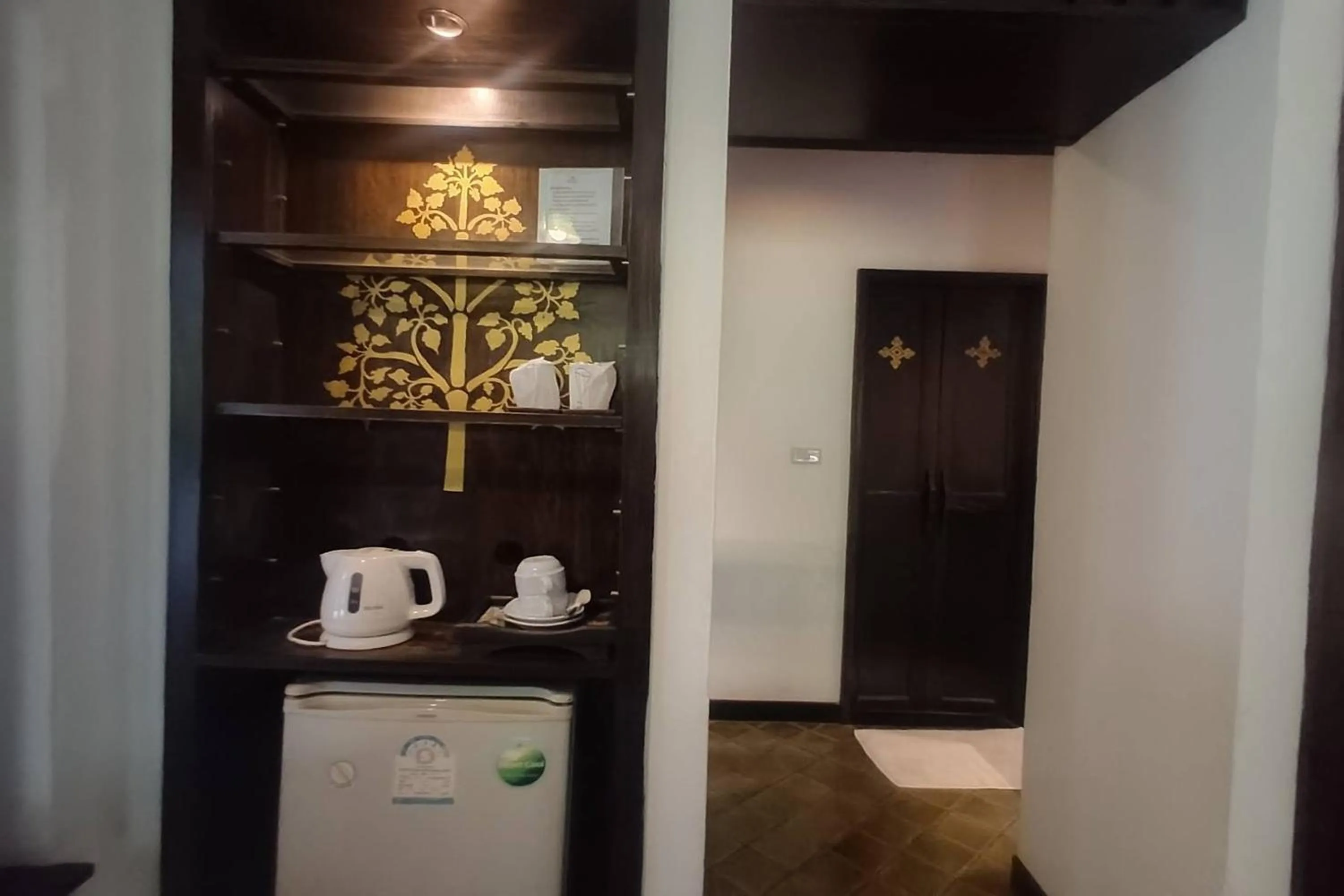Kitchen or kitchenette in Baan Orawee Boutique Hotel