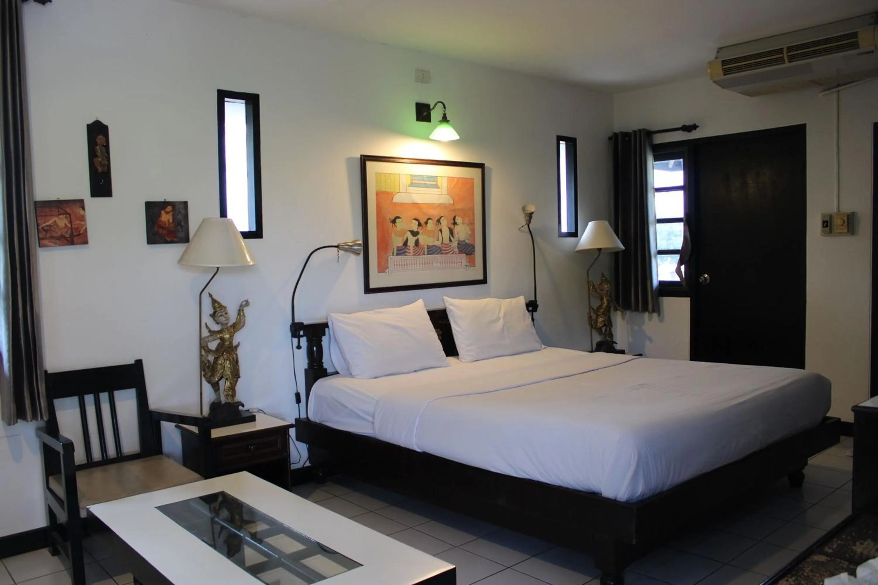 Bed in Baan Orawee Boutique Hotel