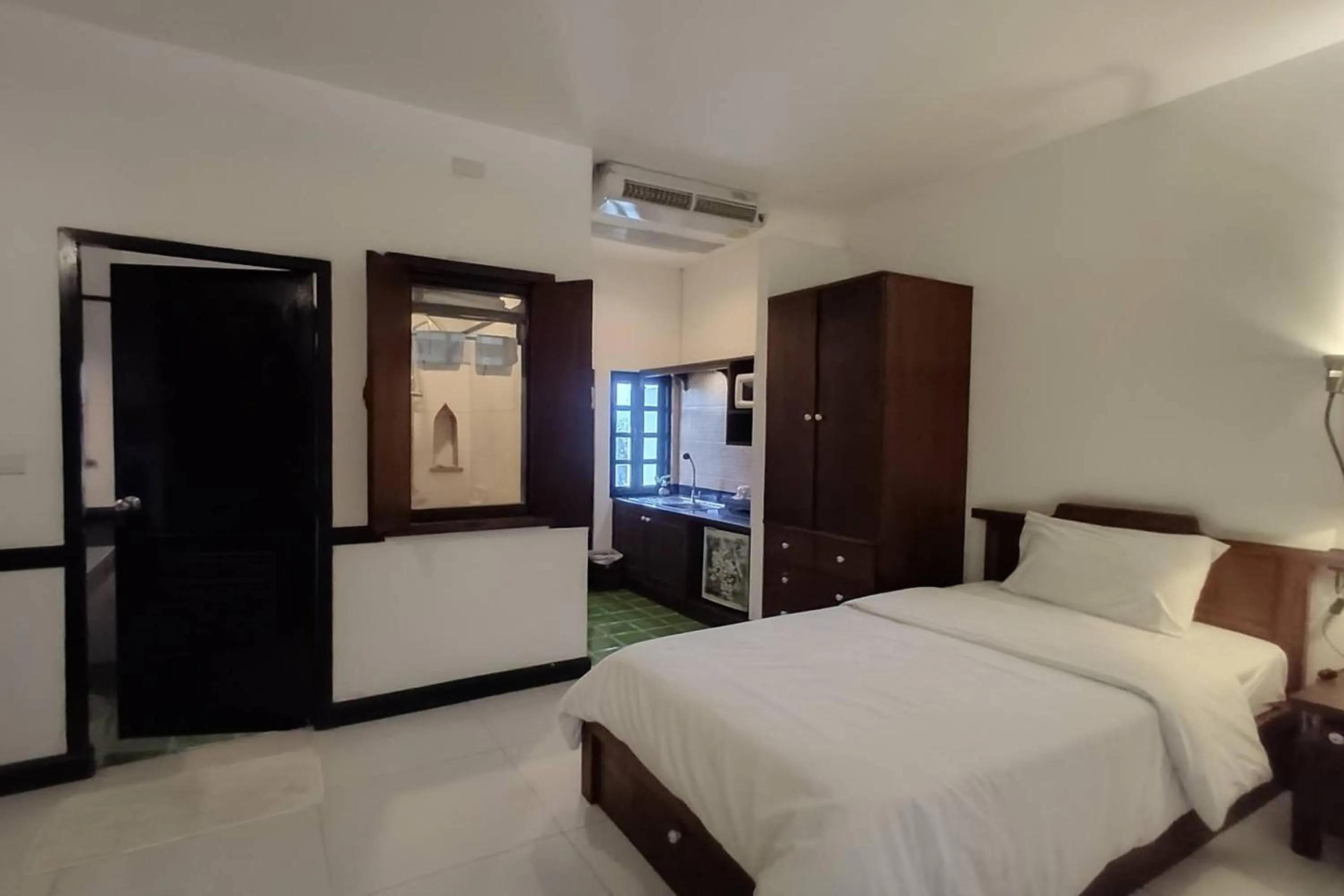 Bed in Baan Orawee Boutique Hotel