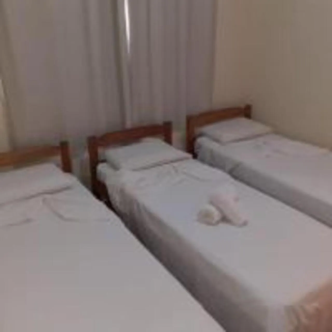 Bed in QualyLeste Hotel