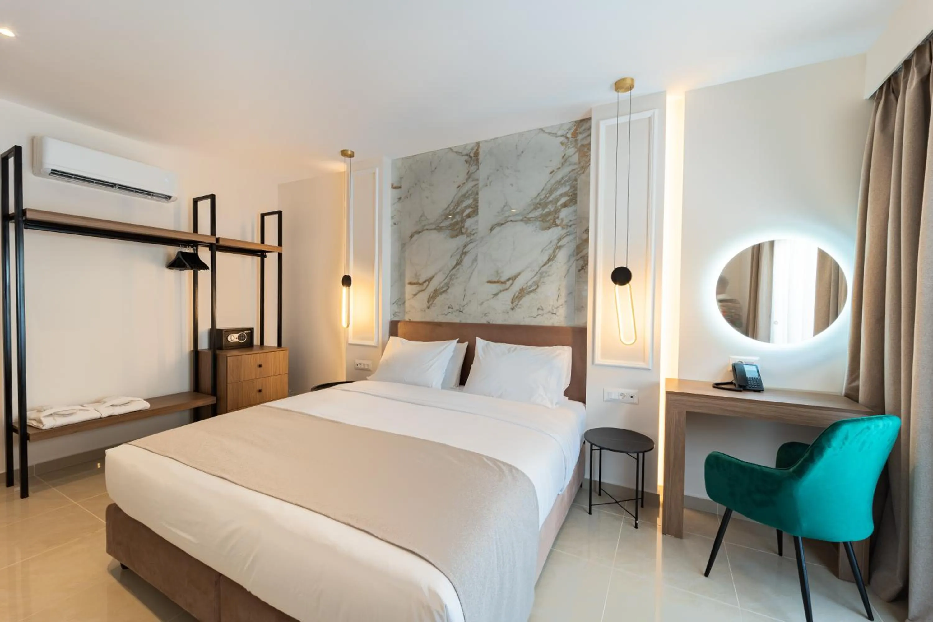 Bed in Philia Center Suites