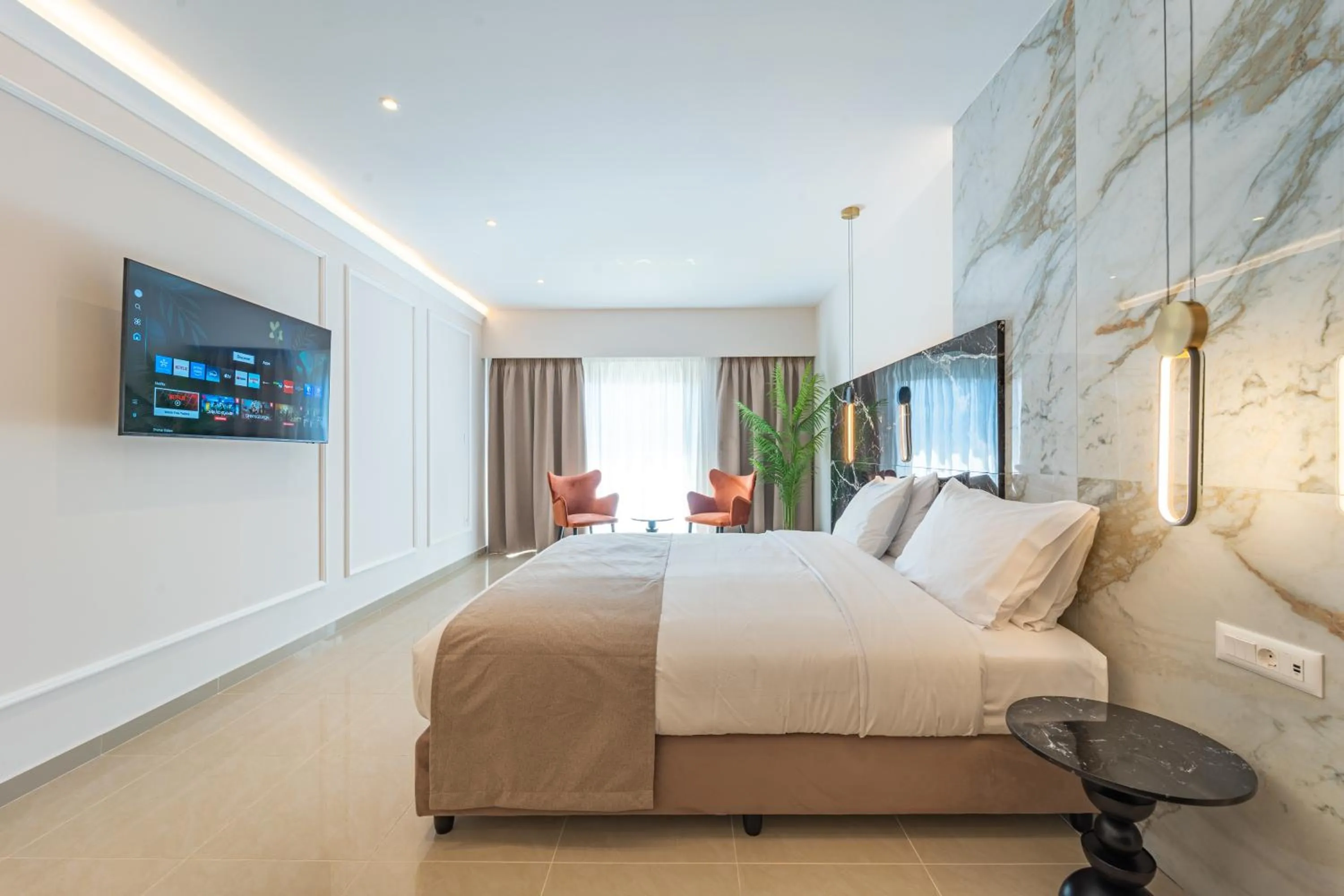 Photo of the whole room, Bed in Philia Center Suites