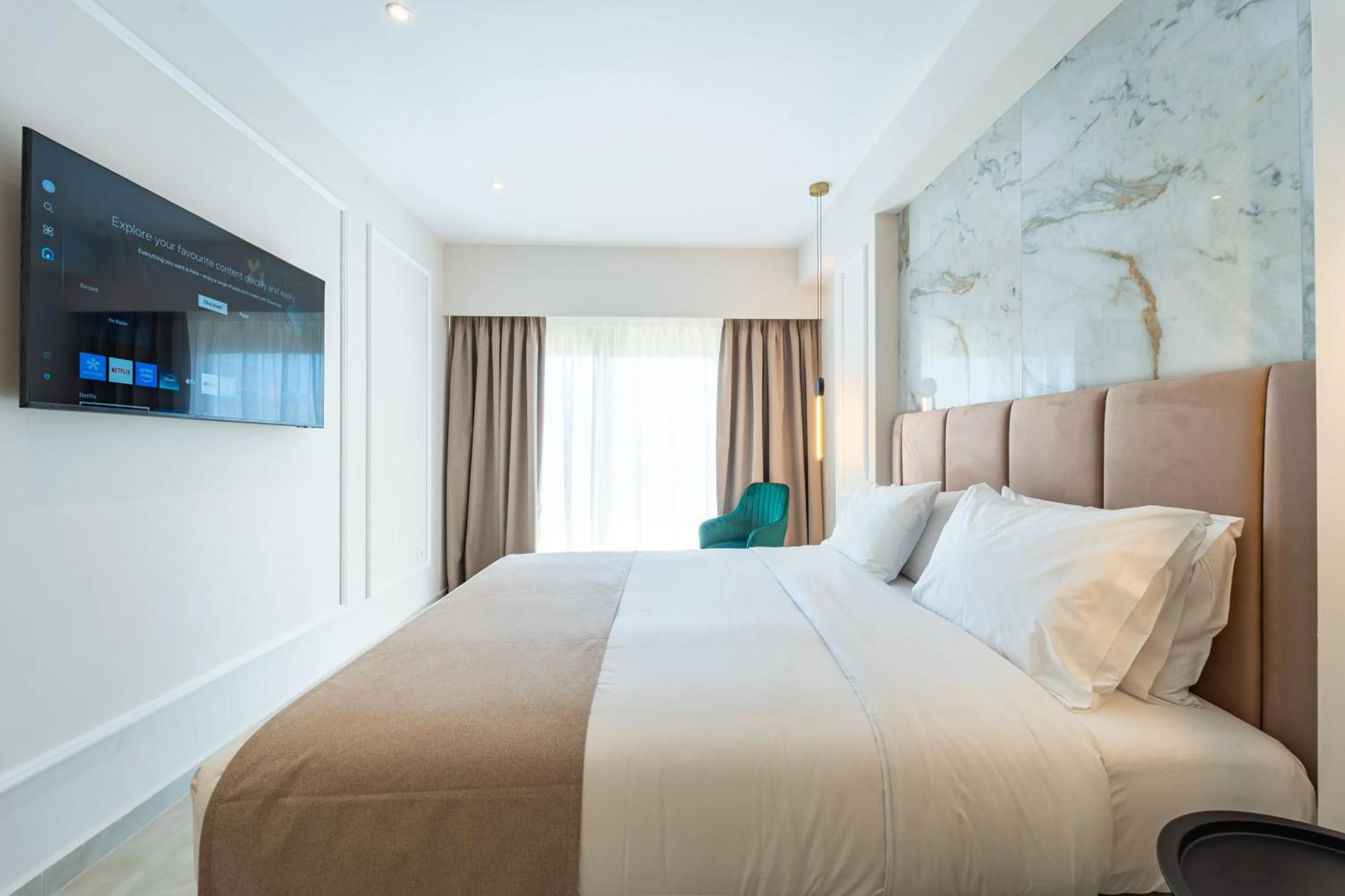 Photo of the whole room, Bed in Philia Center Suites