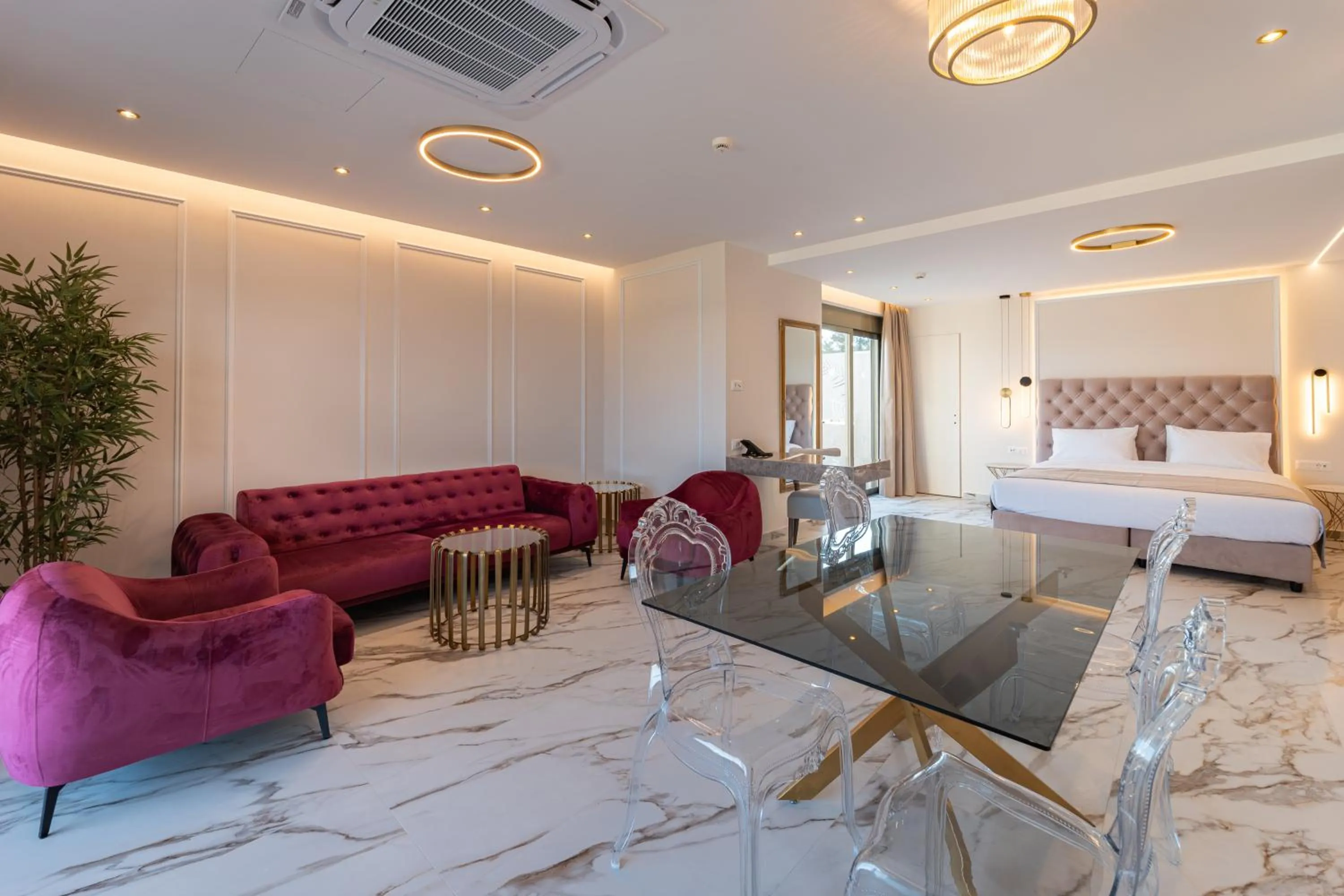 Living room, Bed in Philia Center Suites