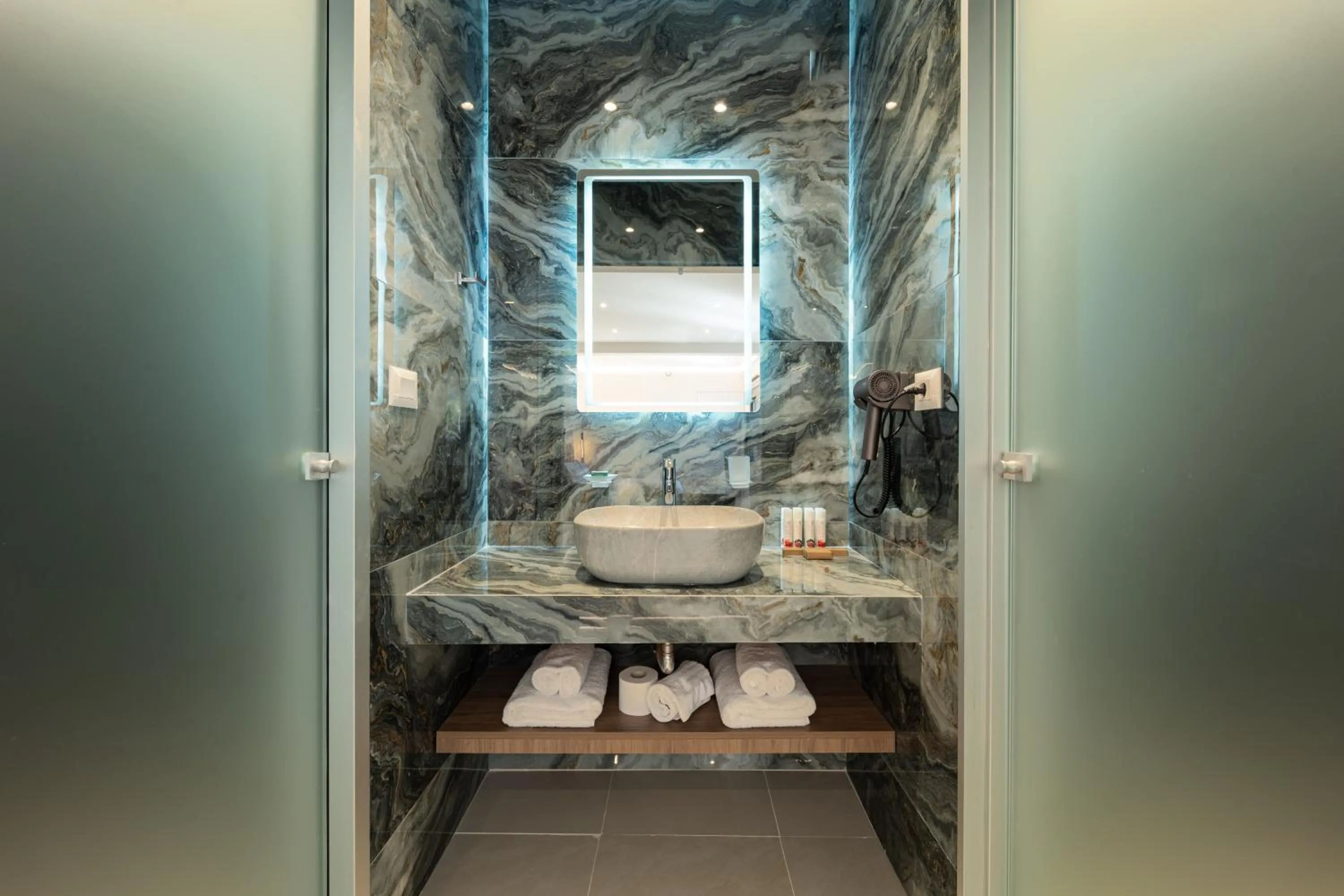 Bathroom in Philia Center Suites