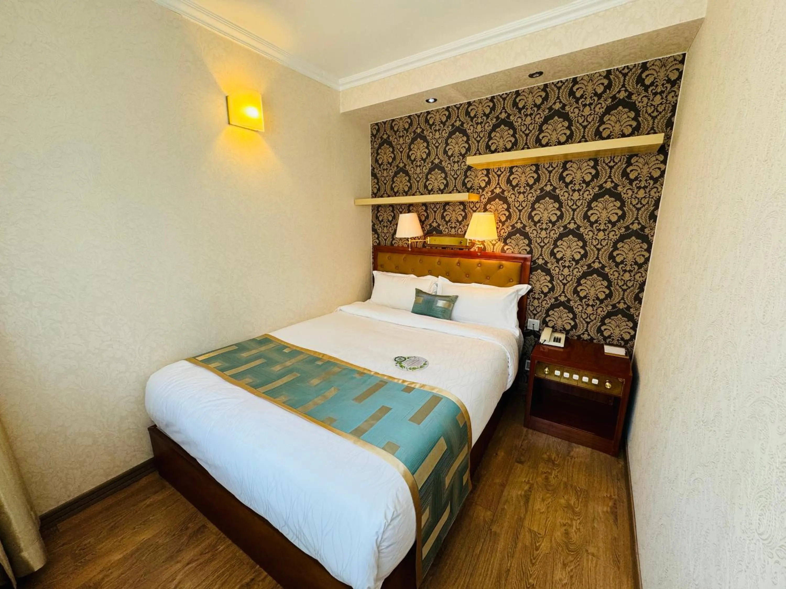 Kitchen or kitchenette, Bed in Flower Hotel Ulaanbaatar