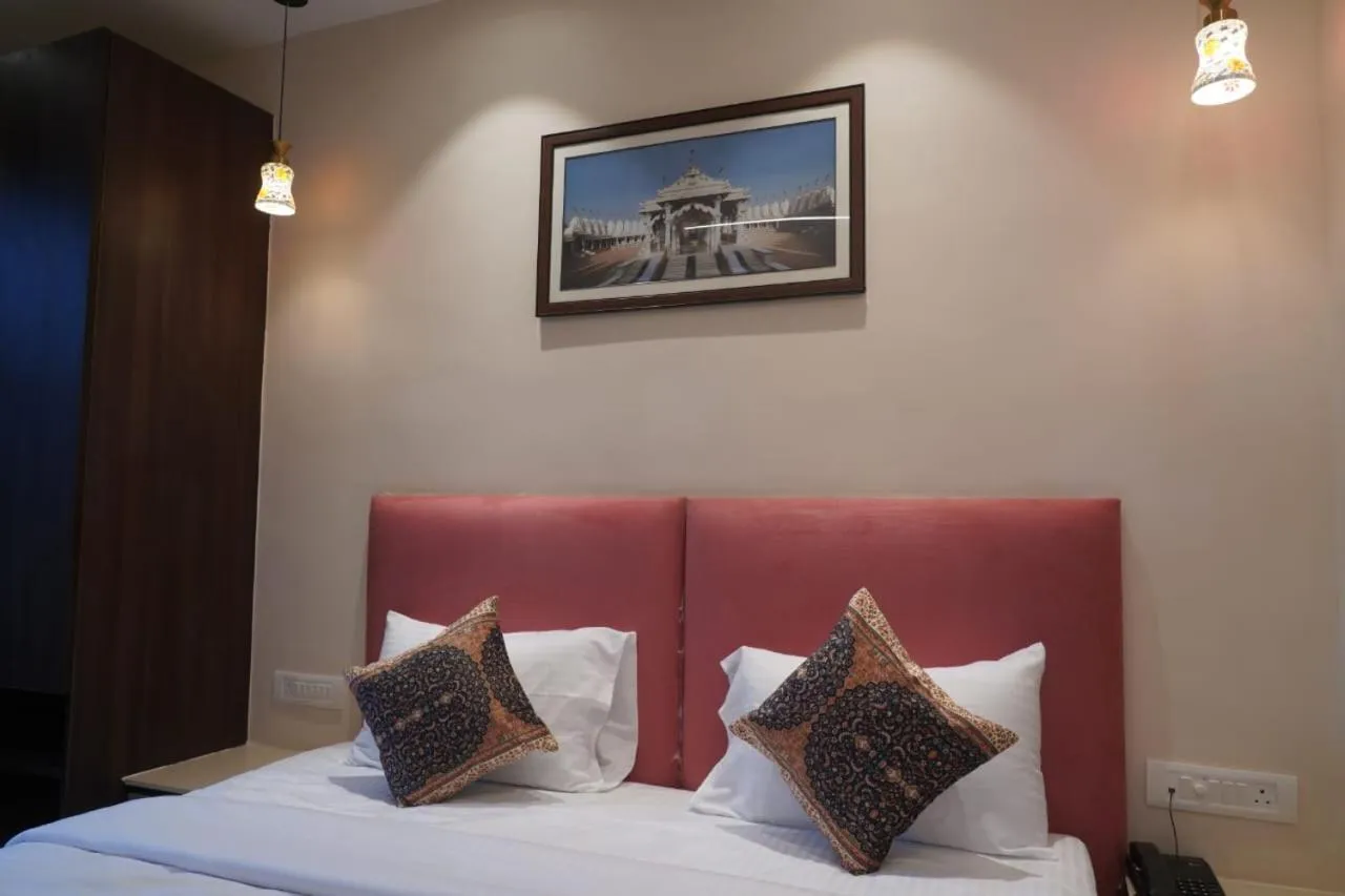 Bed in Hotel Anant Inn