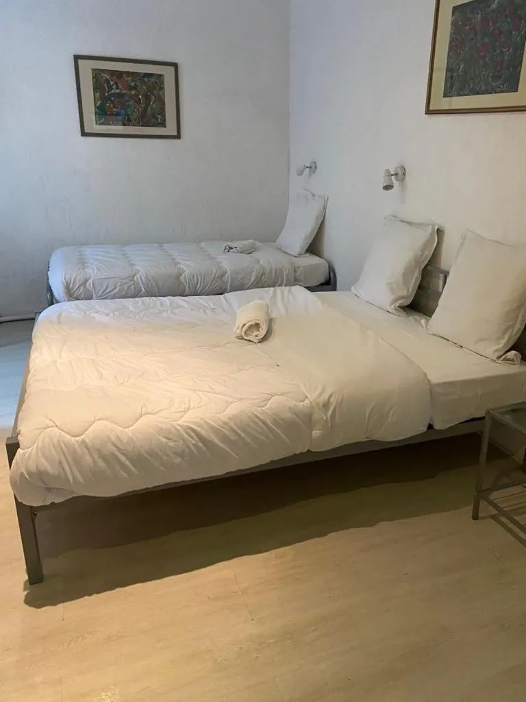Bed in Hotel Du Commerce