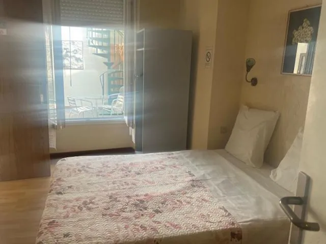 Bed in Hotel Du Commerce