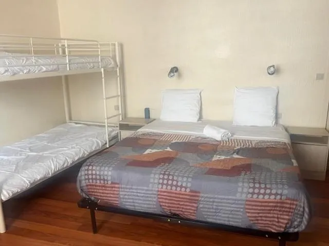 Bed in Hotel Du Commerce