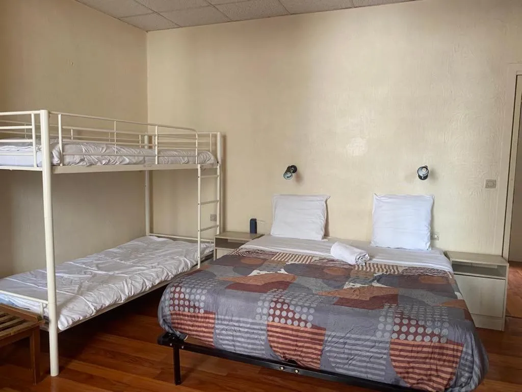 Bed in Hotel Du Commerce