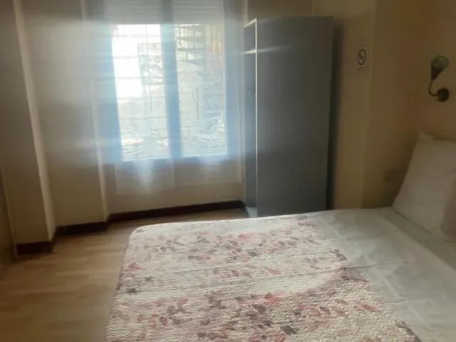 Bed in Hotel Du Commerce