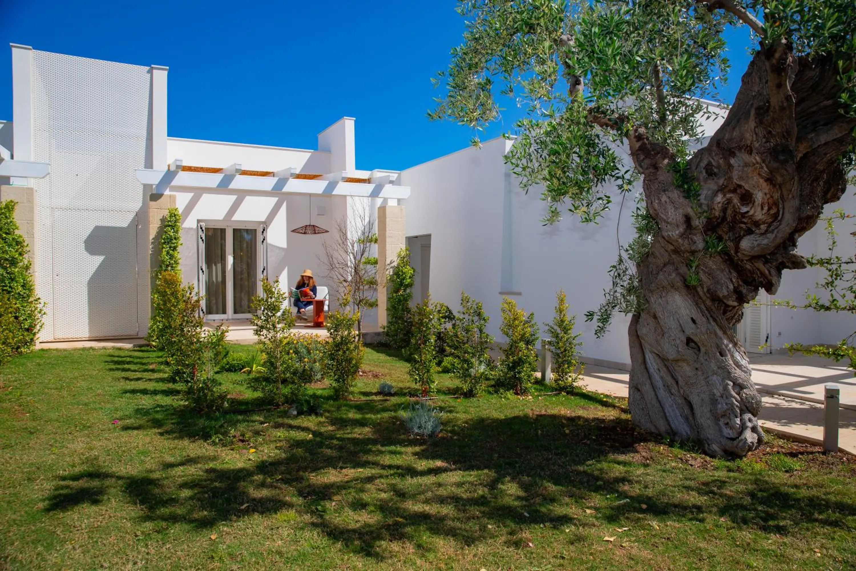 Garden view in Cala Ponte, a Tribute Portfolio Hotel