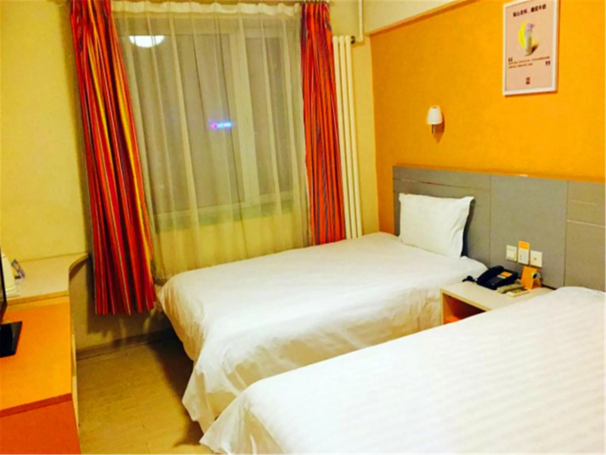 Bedroom, Bed in 7Days Inn Harbin Chengde Plaza