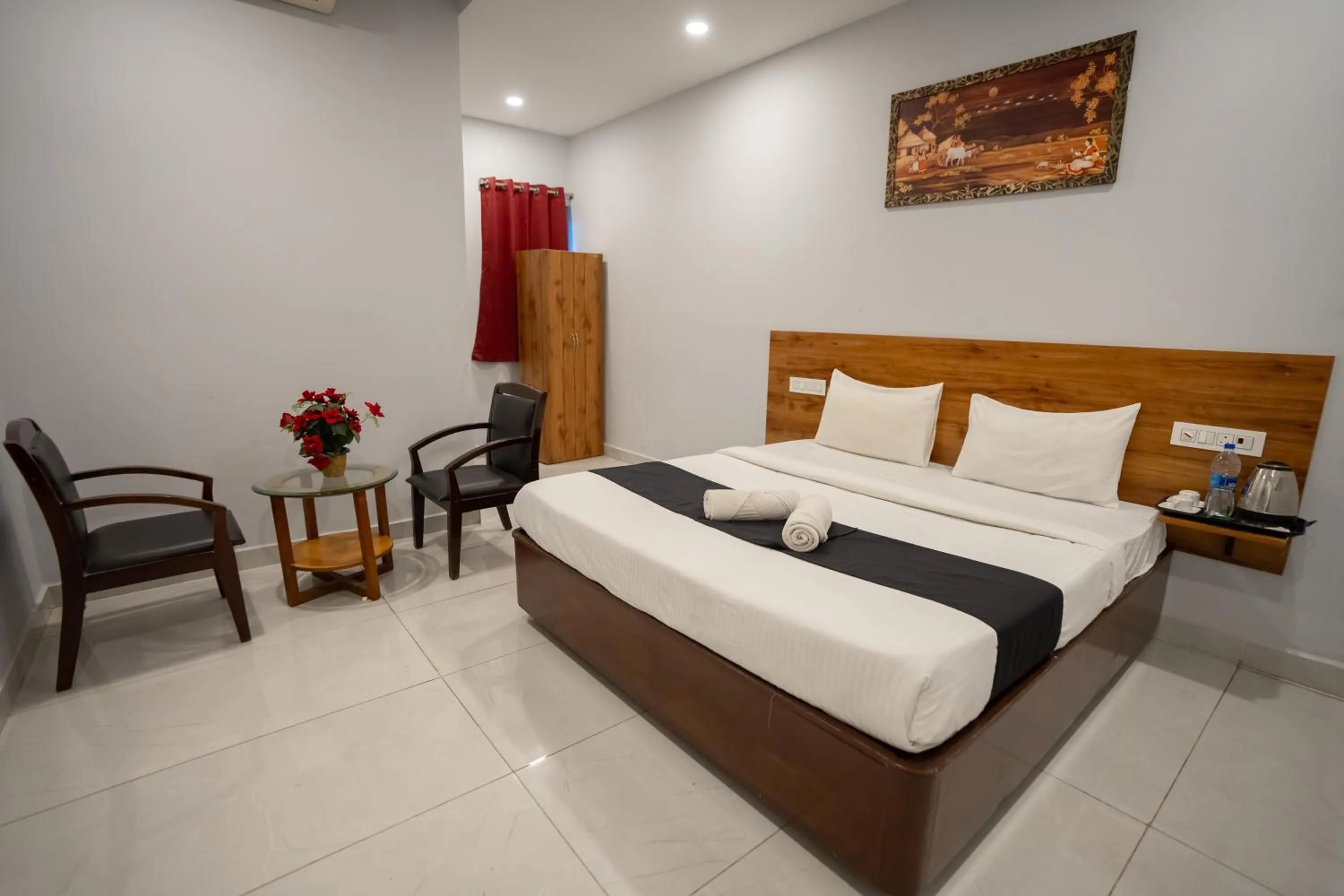 Bed in Hotel Vaishnavi Classic