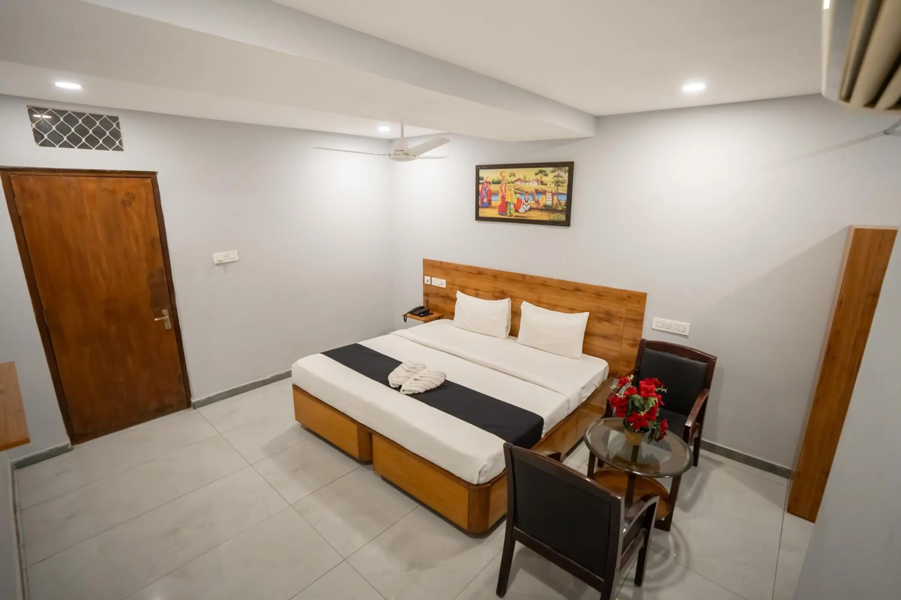 Bed in Hotel Vaishnavi Classic