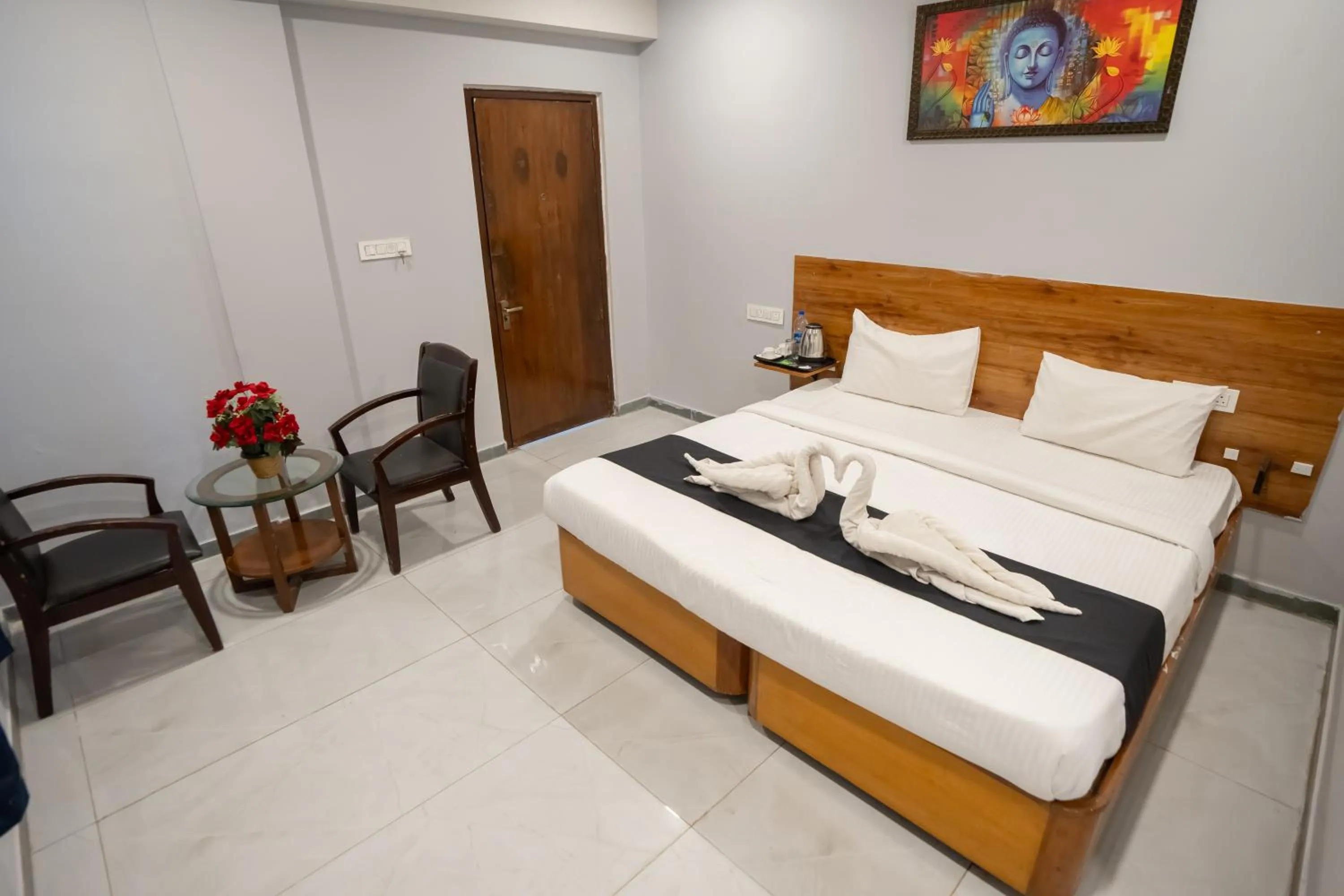Bed in Hotel Vaishnavi Classic